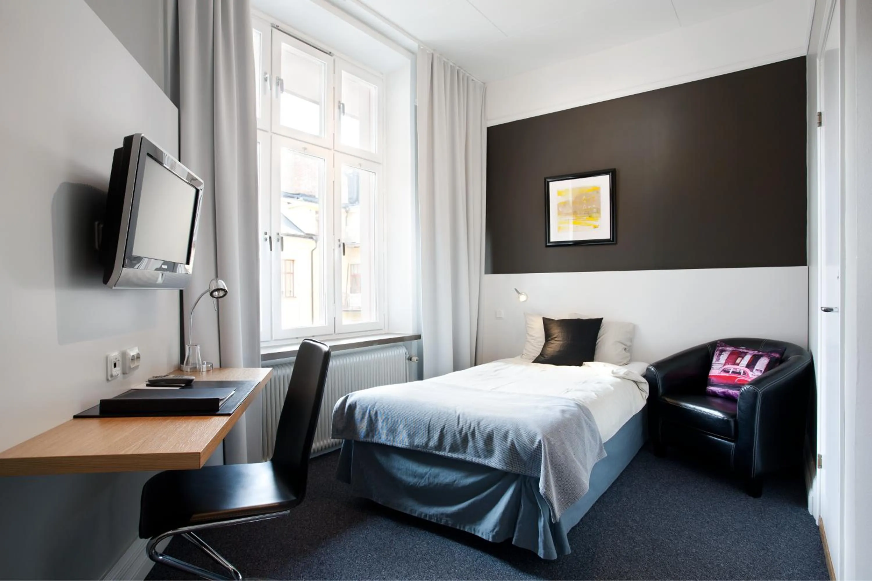 Photo of the whole room, Bed in Hotel Örebro
