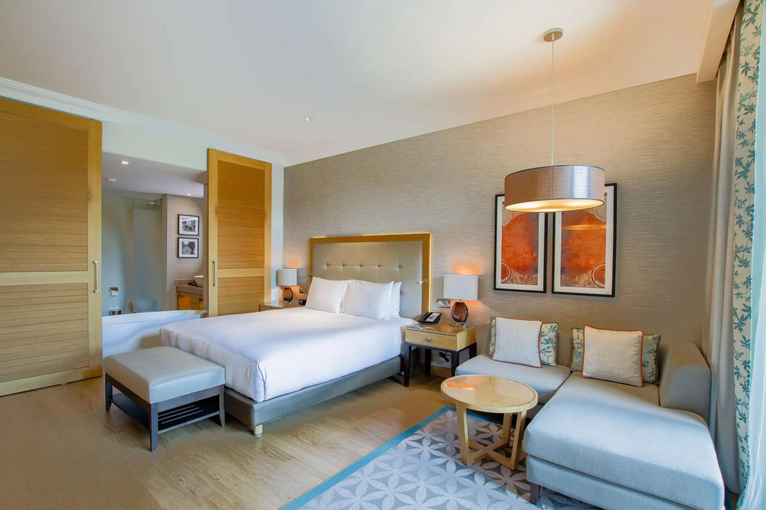 Living room, Bed in Hilton Cabo Verde Sal Resort