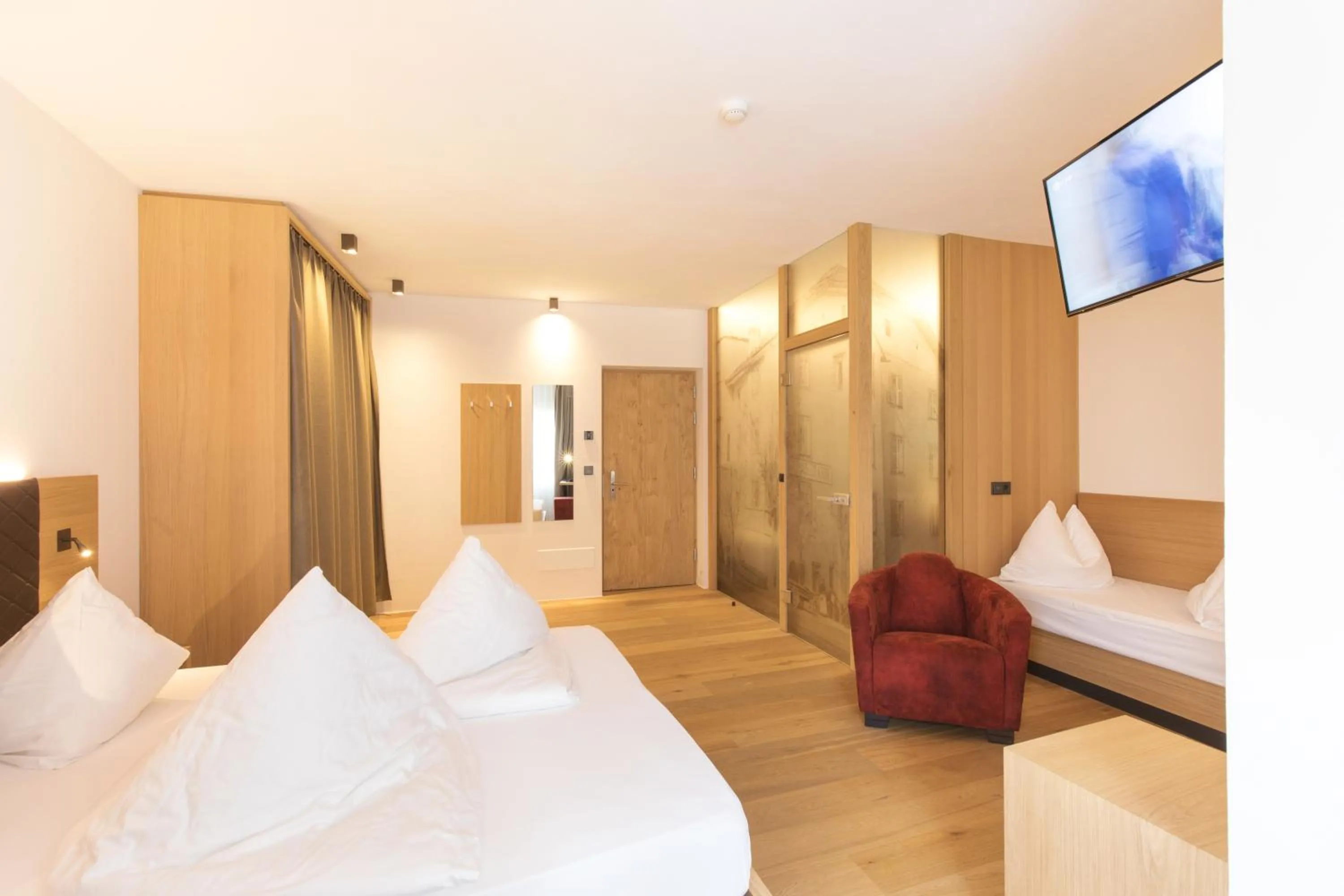 Bed in Belvenu Boutique Hotel