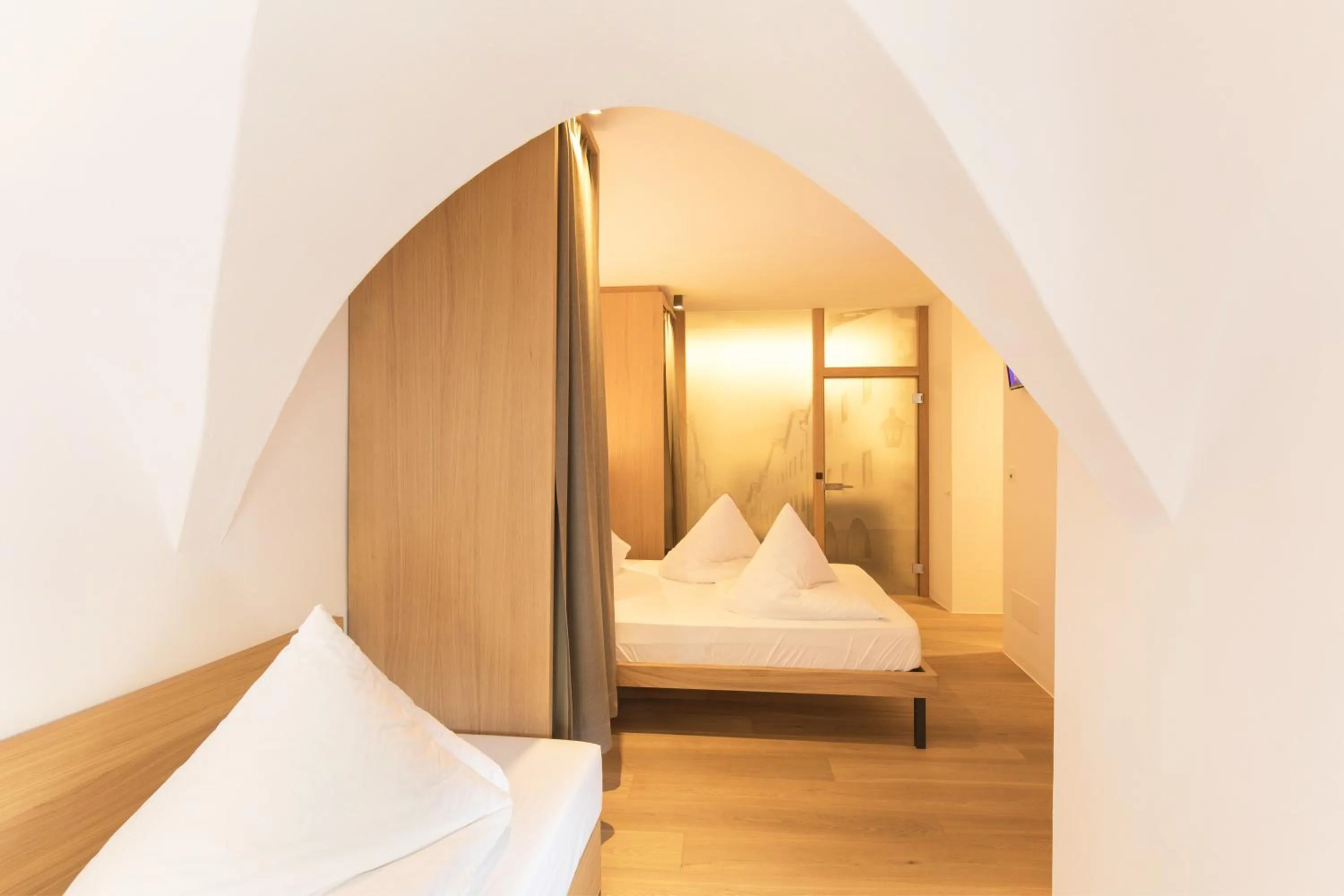 Bed in Belvenu Boutique Hotel