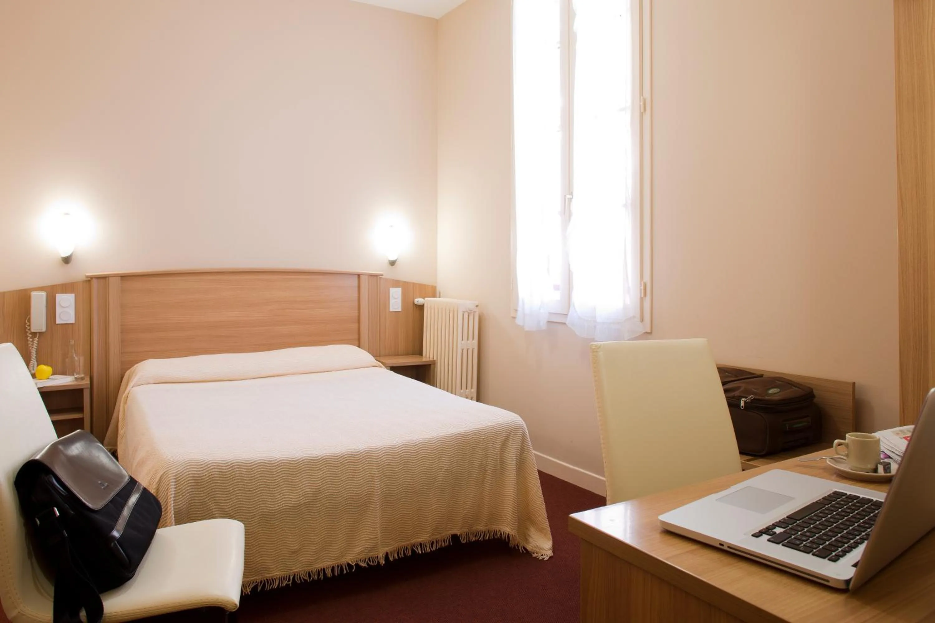 Photo of the whole room, Bed in Hôtel Le Commerce