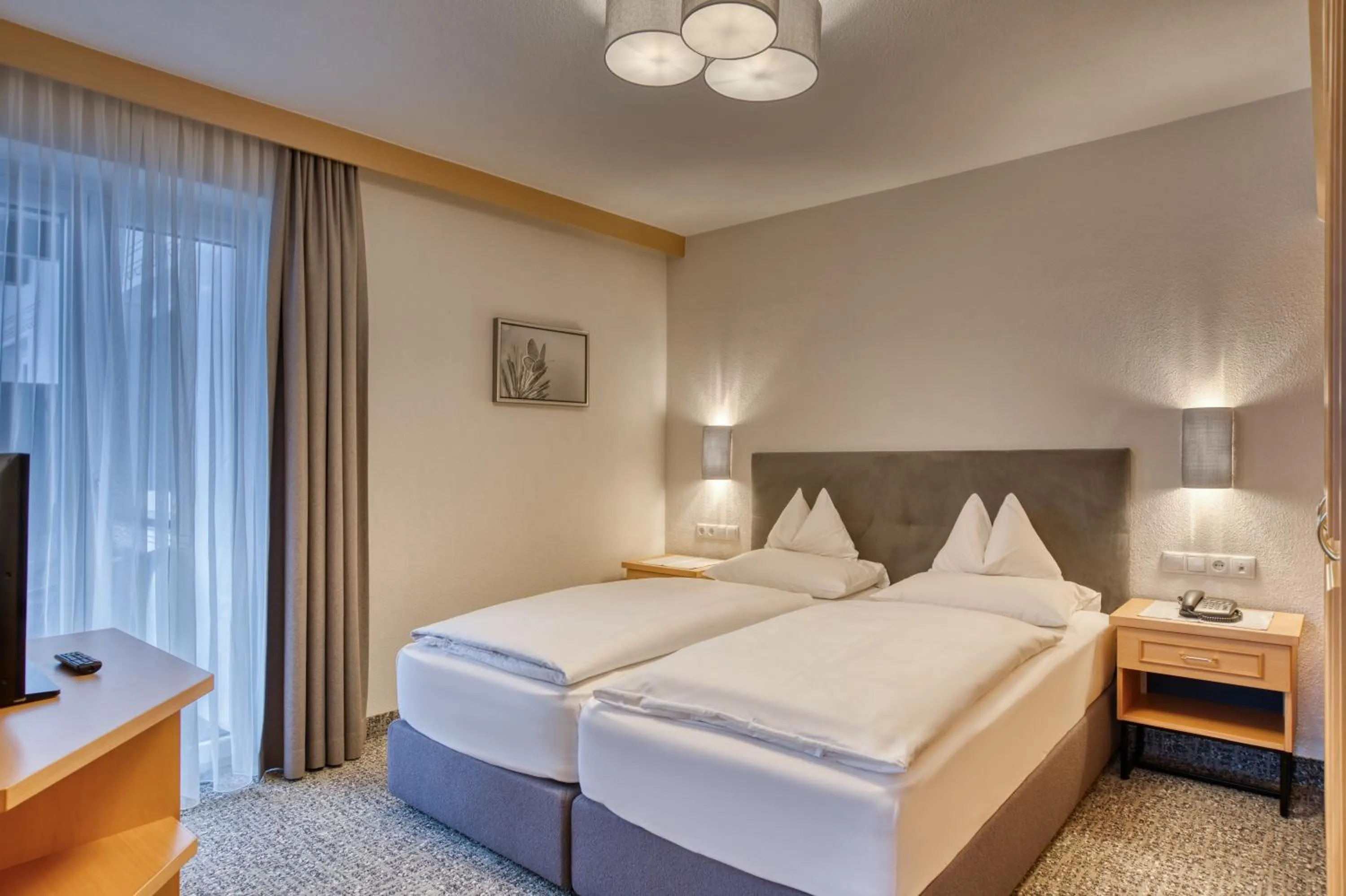 Bedroom, Bed in Parkhotel Seefeld