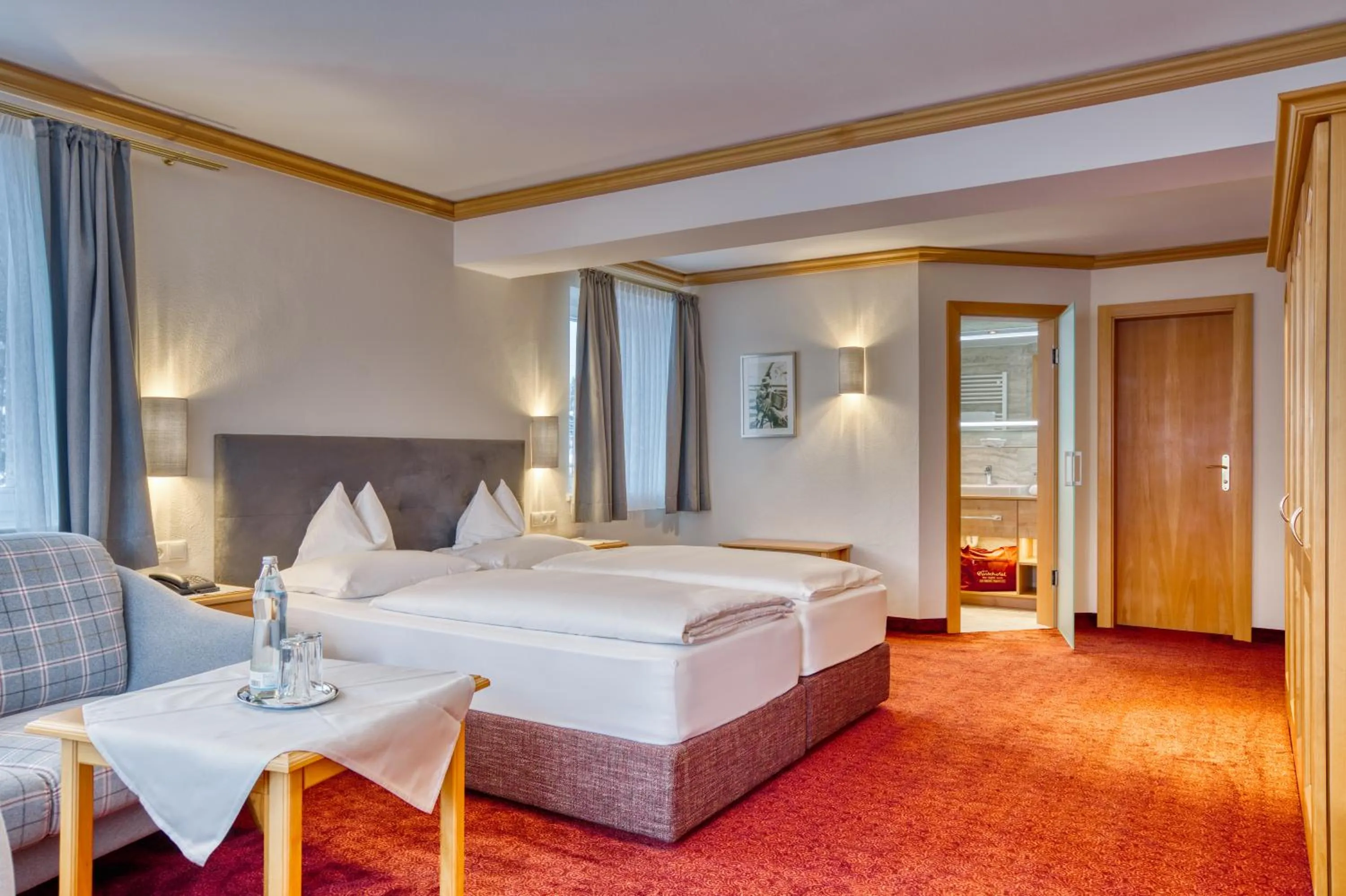 Photo of the whole room, Bed in Parkhotel Seefeld