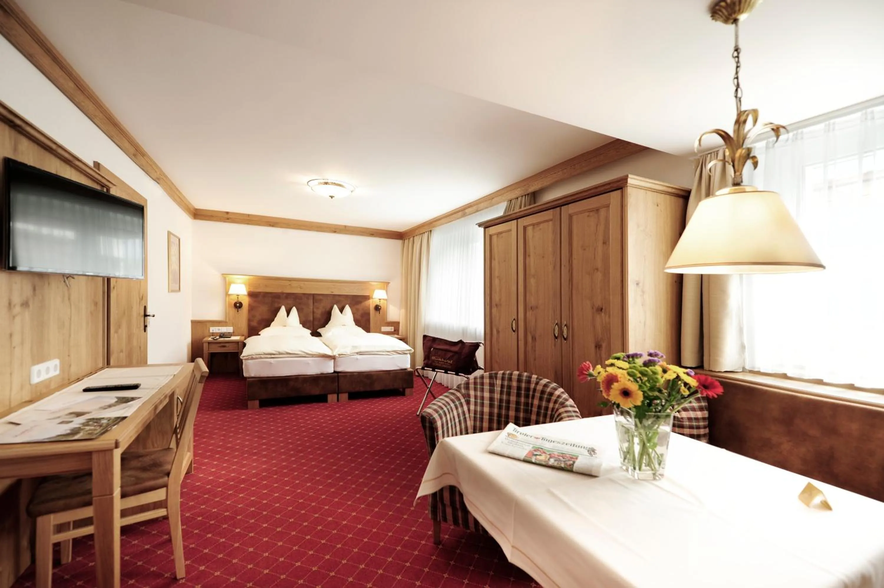Photo of the whole room, Bed in Parkhotel Seefeld