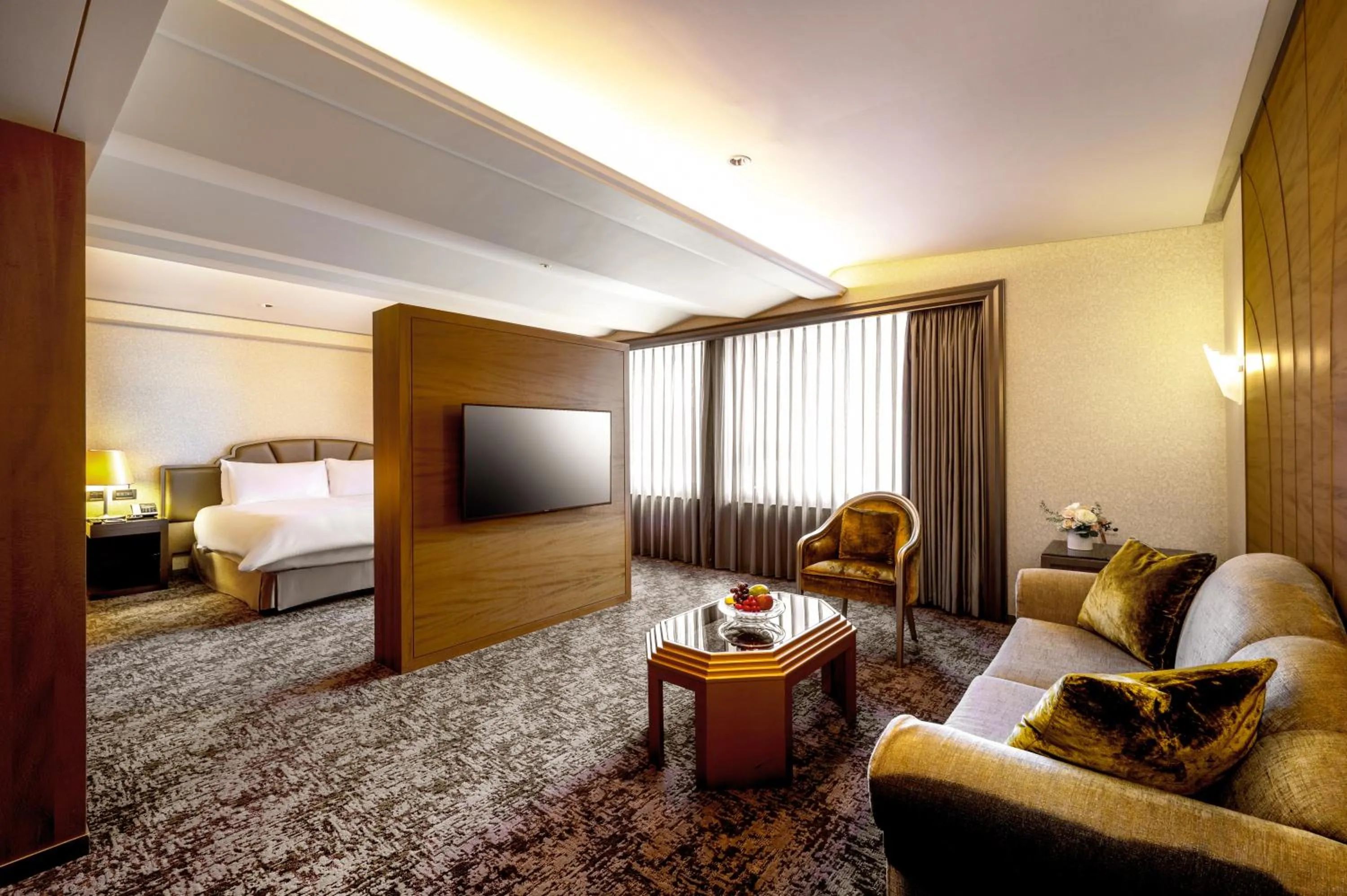 Living room, Bed in The Landis Taipei