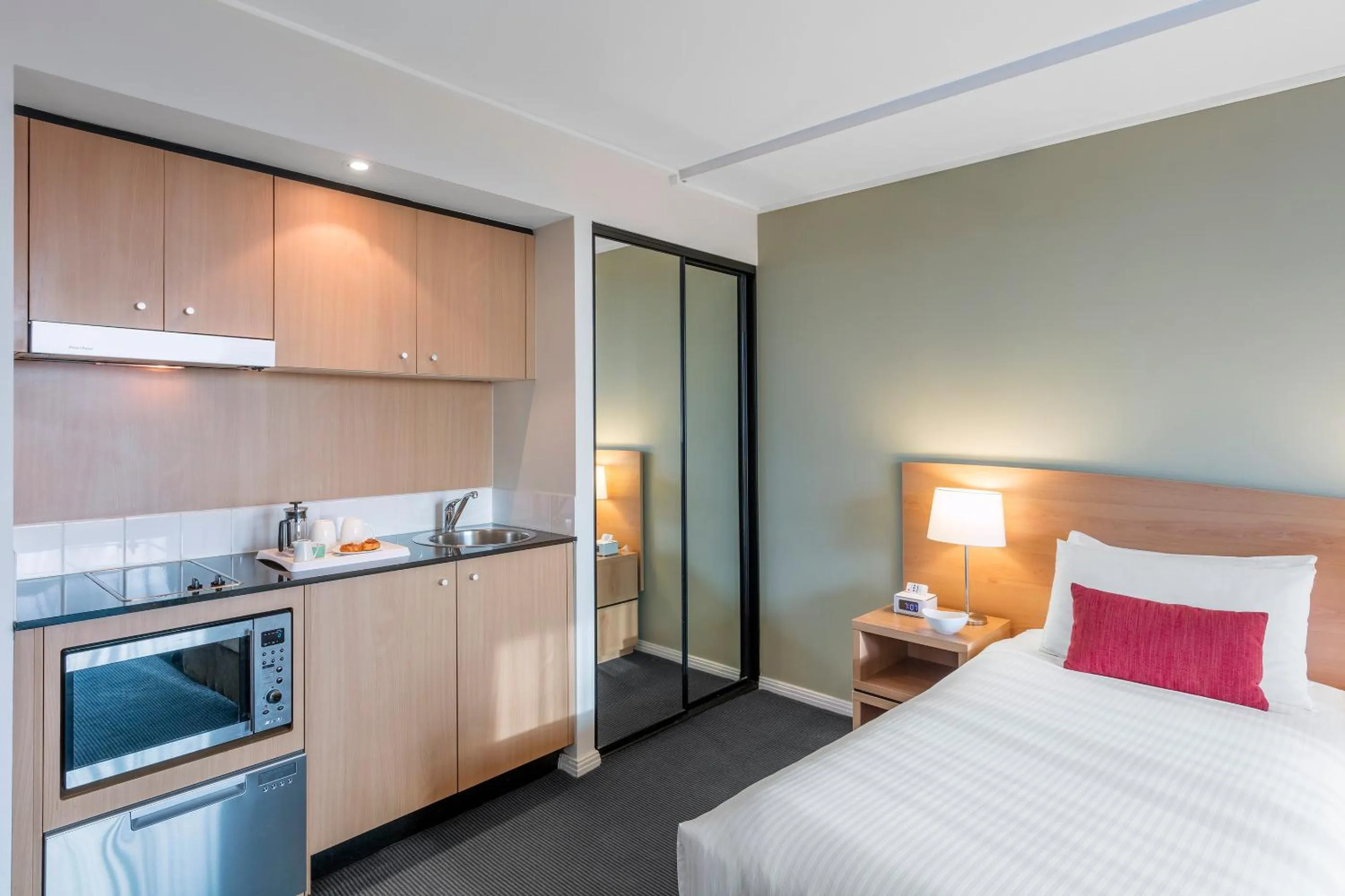 Kitchen or kitchenette, Bed in Nesuto Parramatta