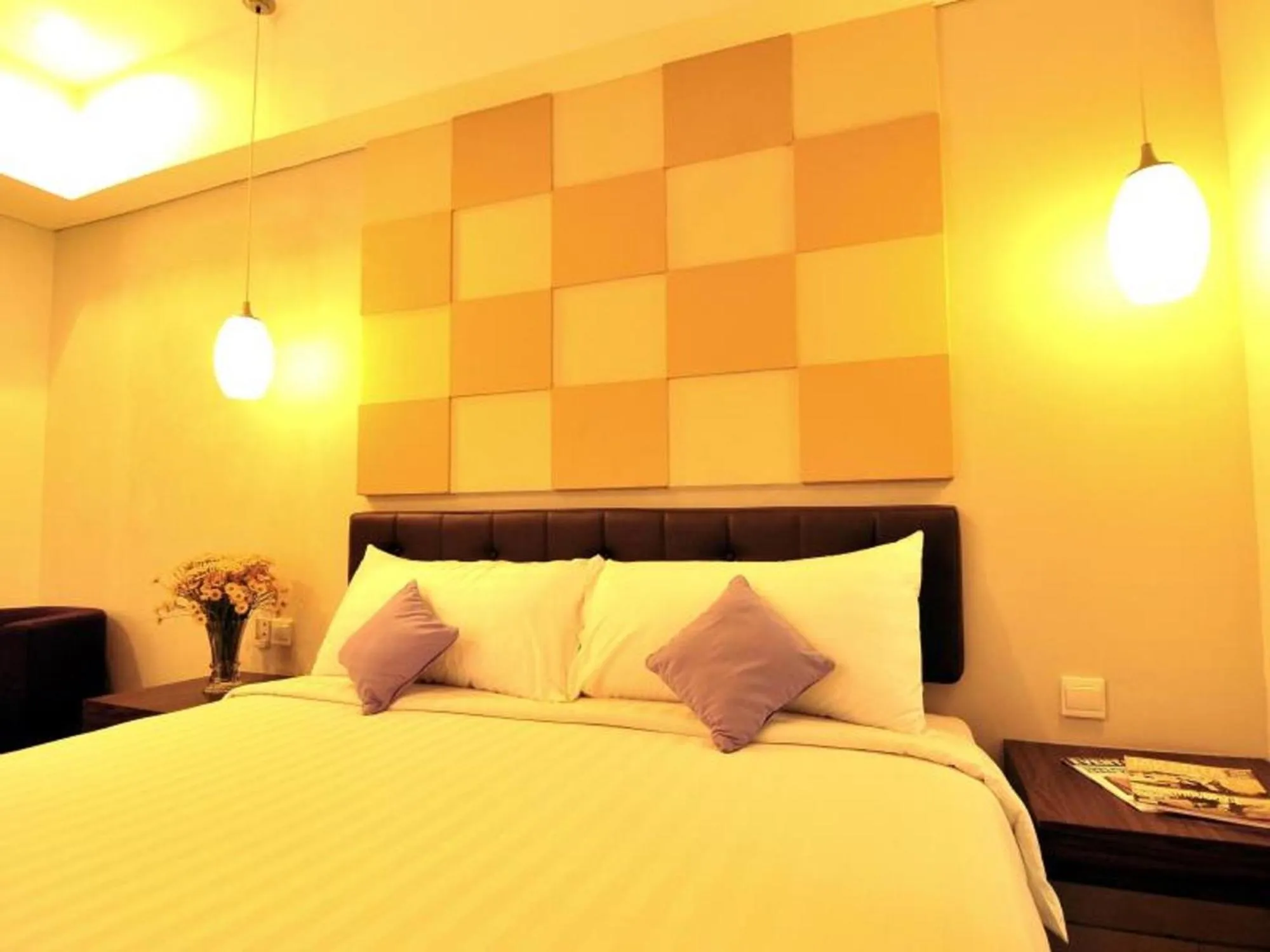 Bed in Aston Ketapang City Hotel