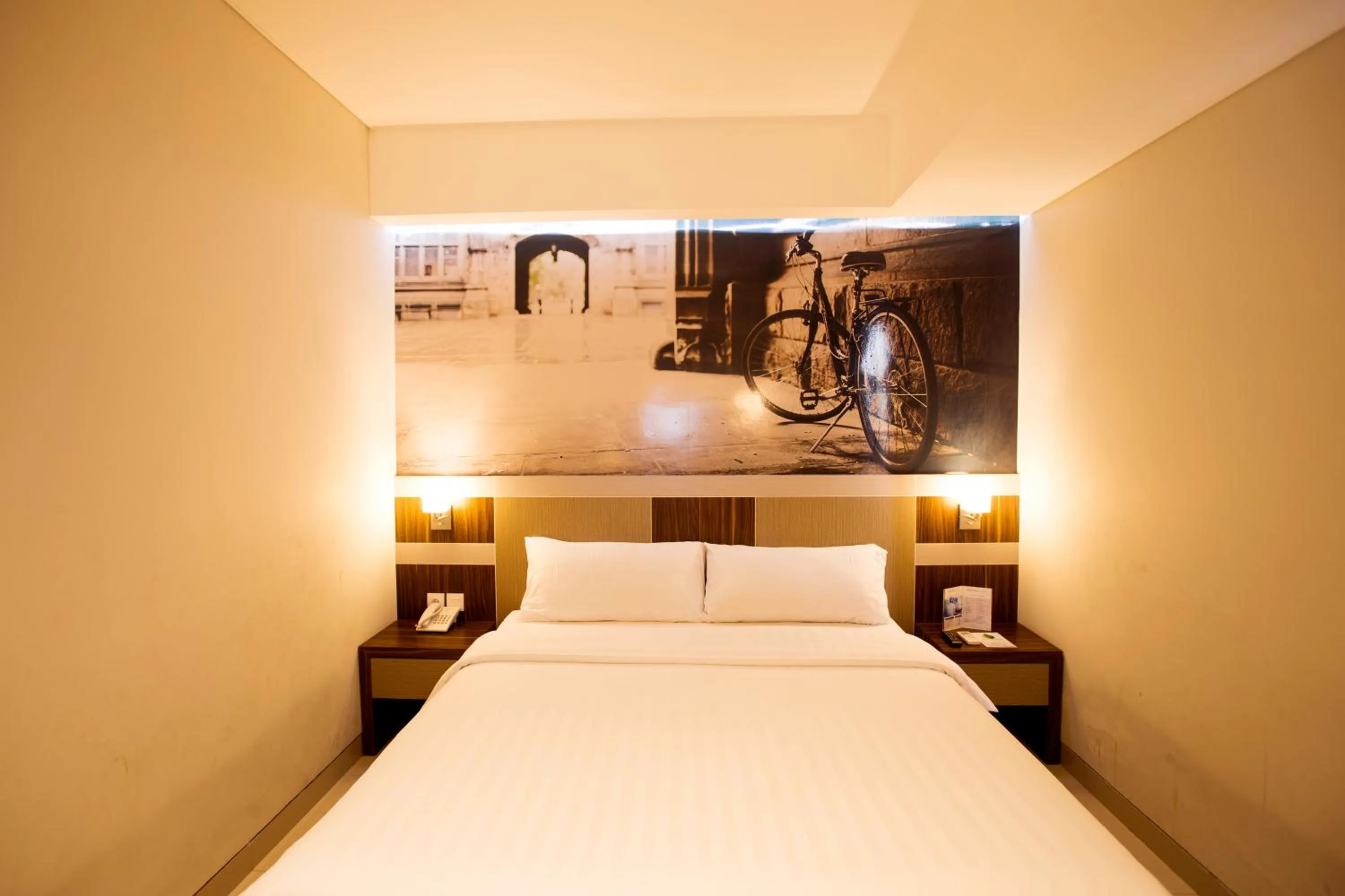 Bed in Aston Ketapang City Hotel