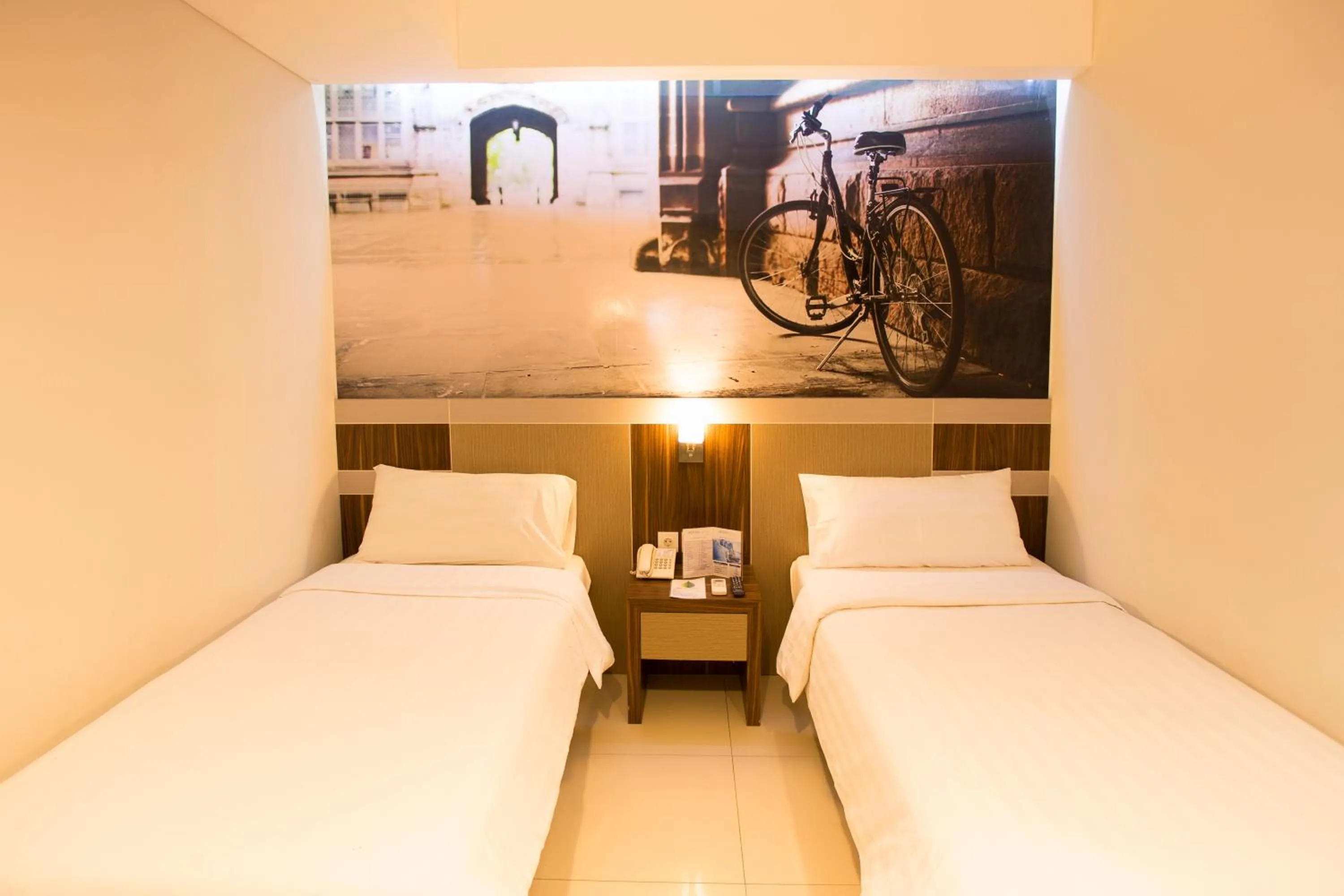 Bed in Aston Ketapang City Hotel