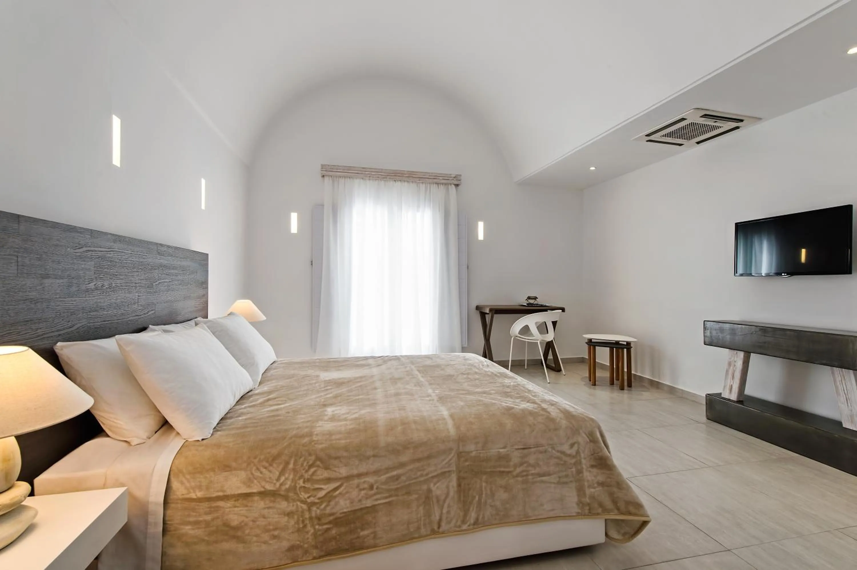 Bed in Cavo Bianco Boutique Hotel & Spa