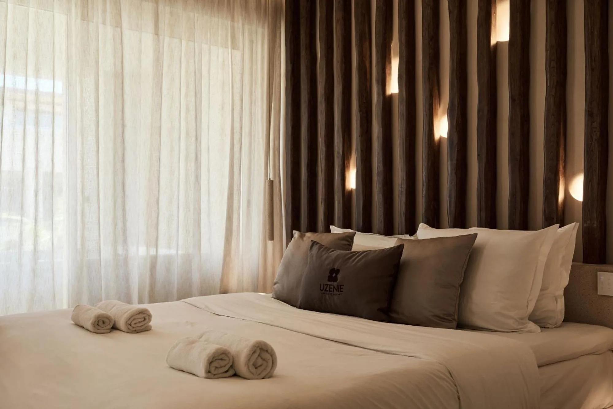 Bed in Uzenie All Suites Boutique Resort