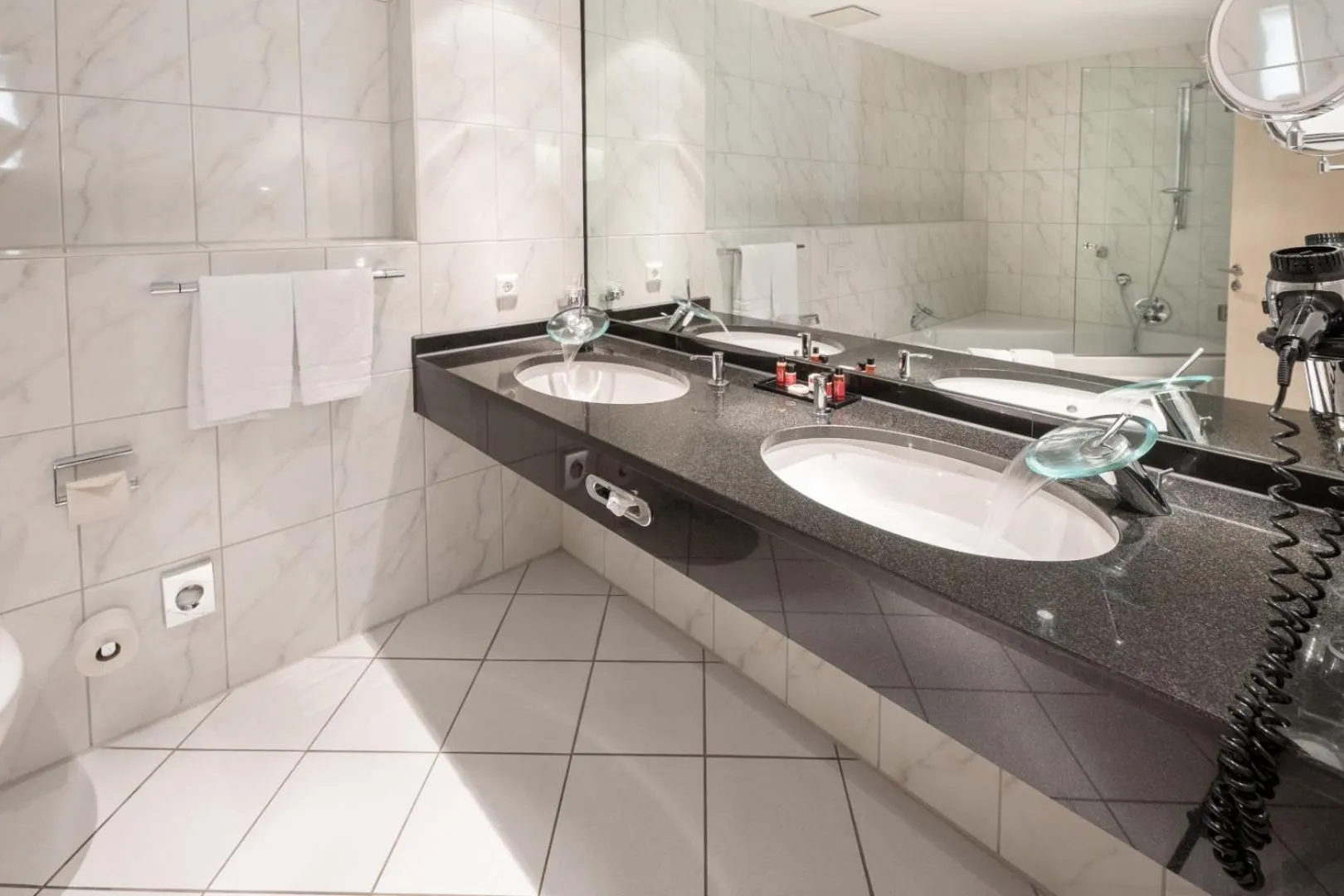 Bathroom in Aspire AcarA Oldenburg, Trademark Collection by Wyndham