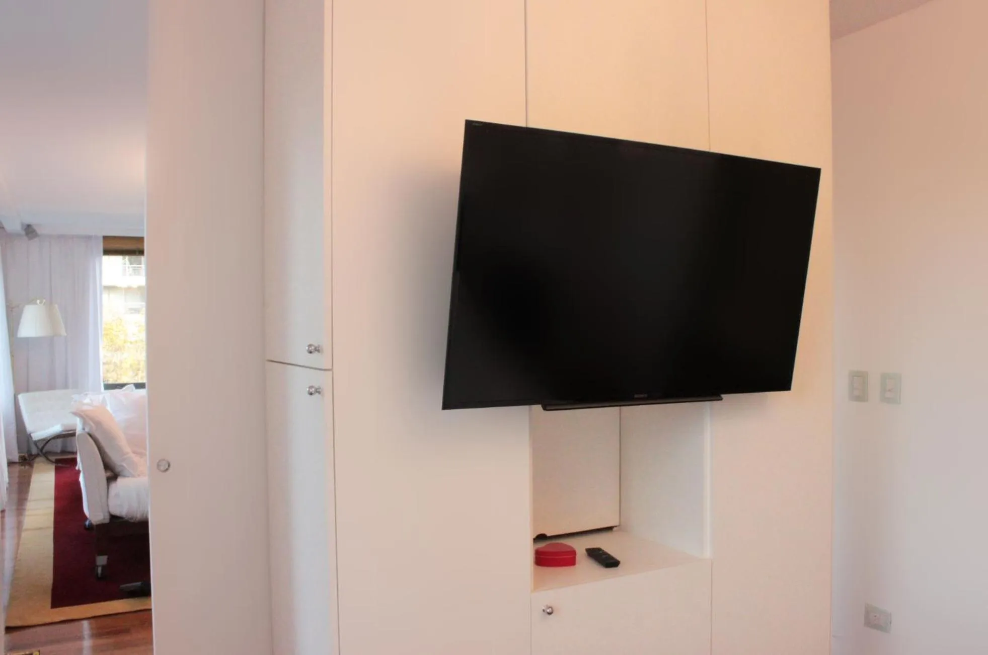 TV and multimedia in Residence Master Suite en Porteño Building