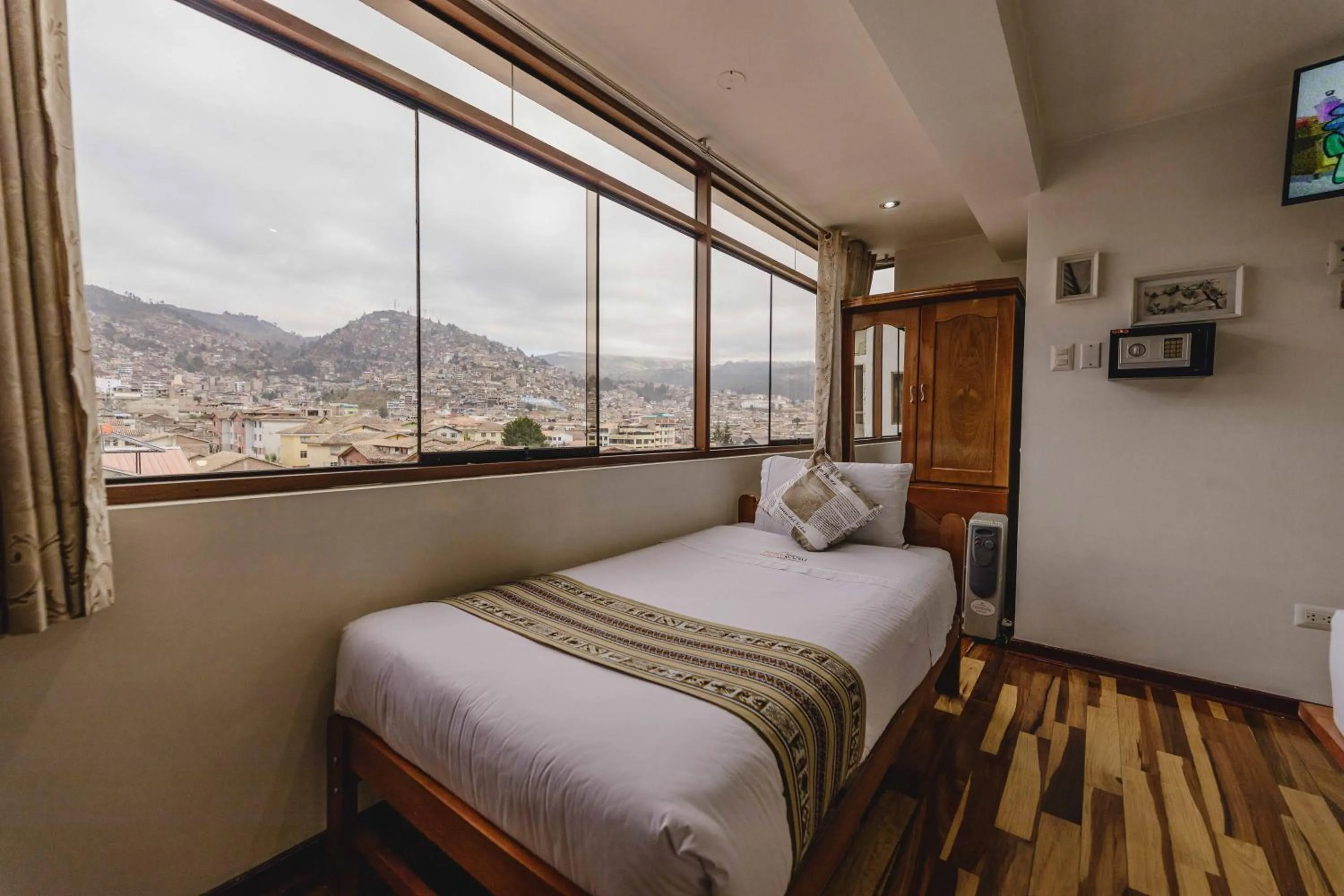 Bed in Cozy Room Cusco