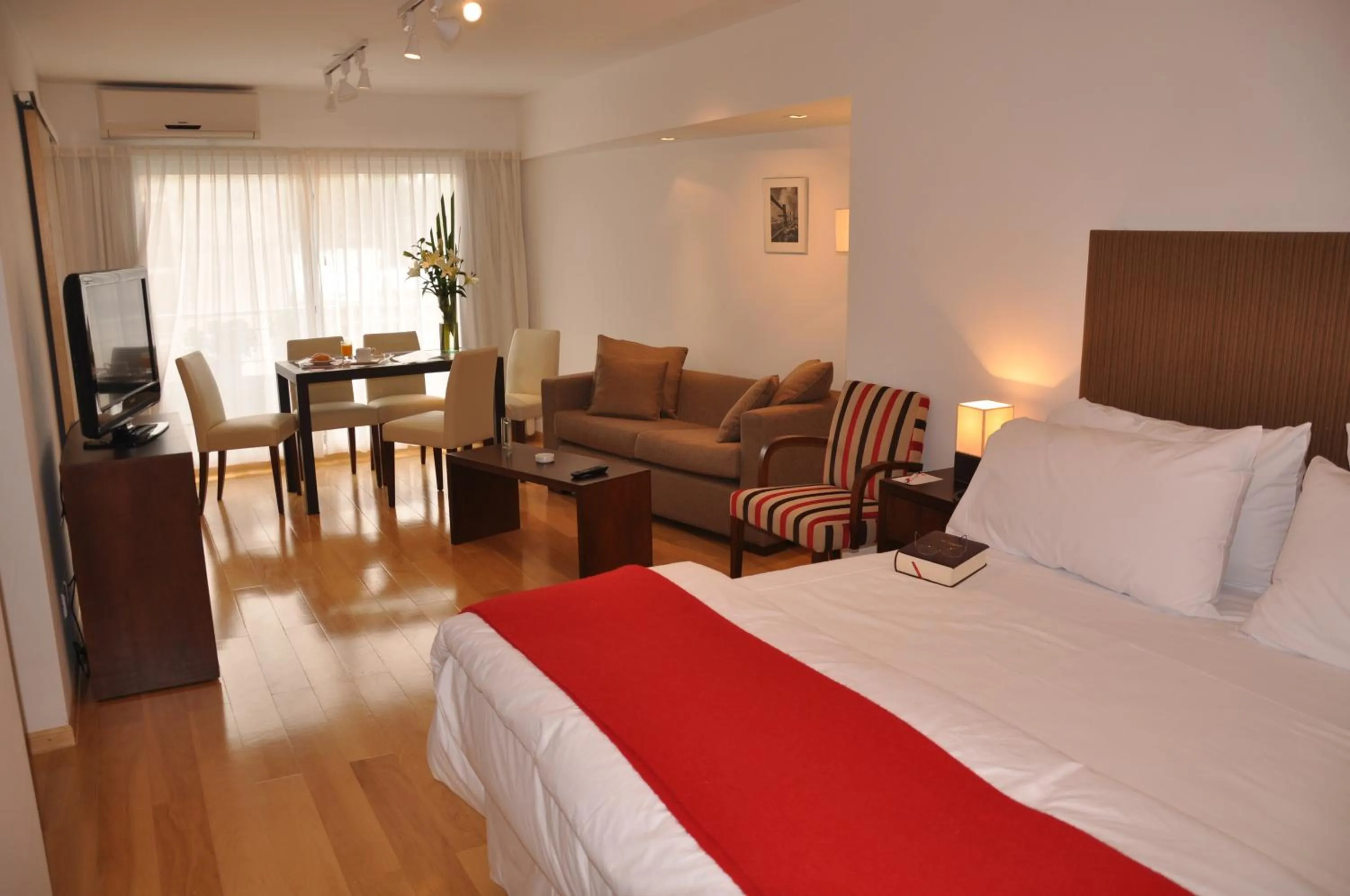 Living room, Bed in Livin' Residence Rosario