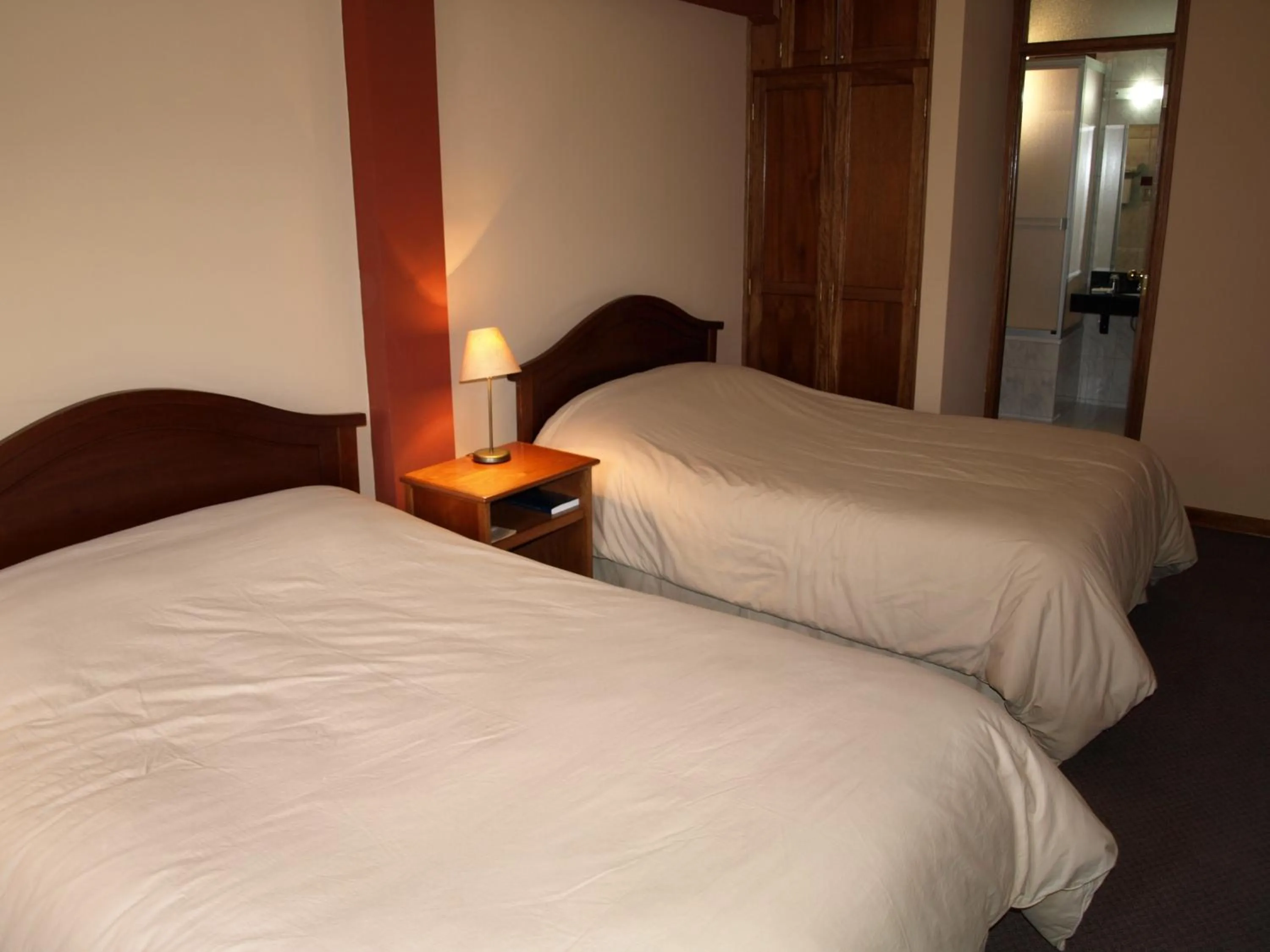 Bed in Qelqatani Hotel