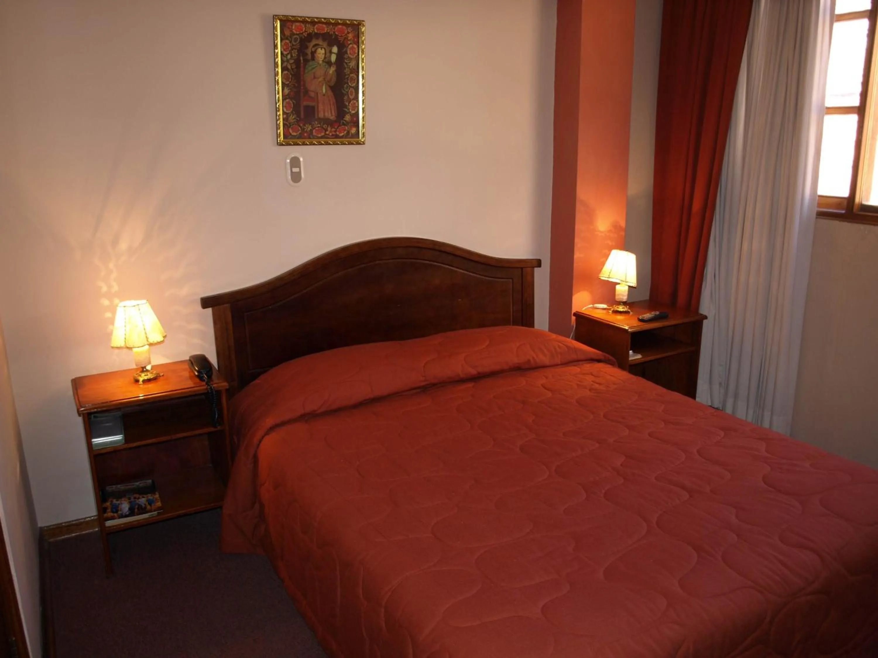 Bed in Qelqatani Hotel