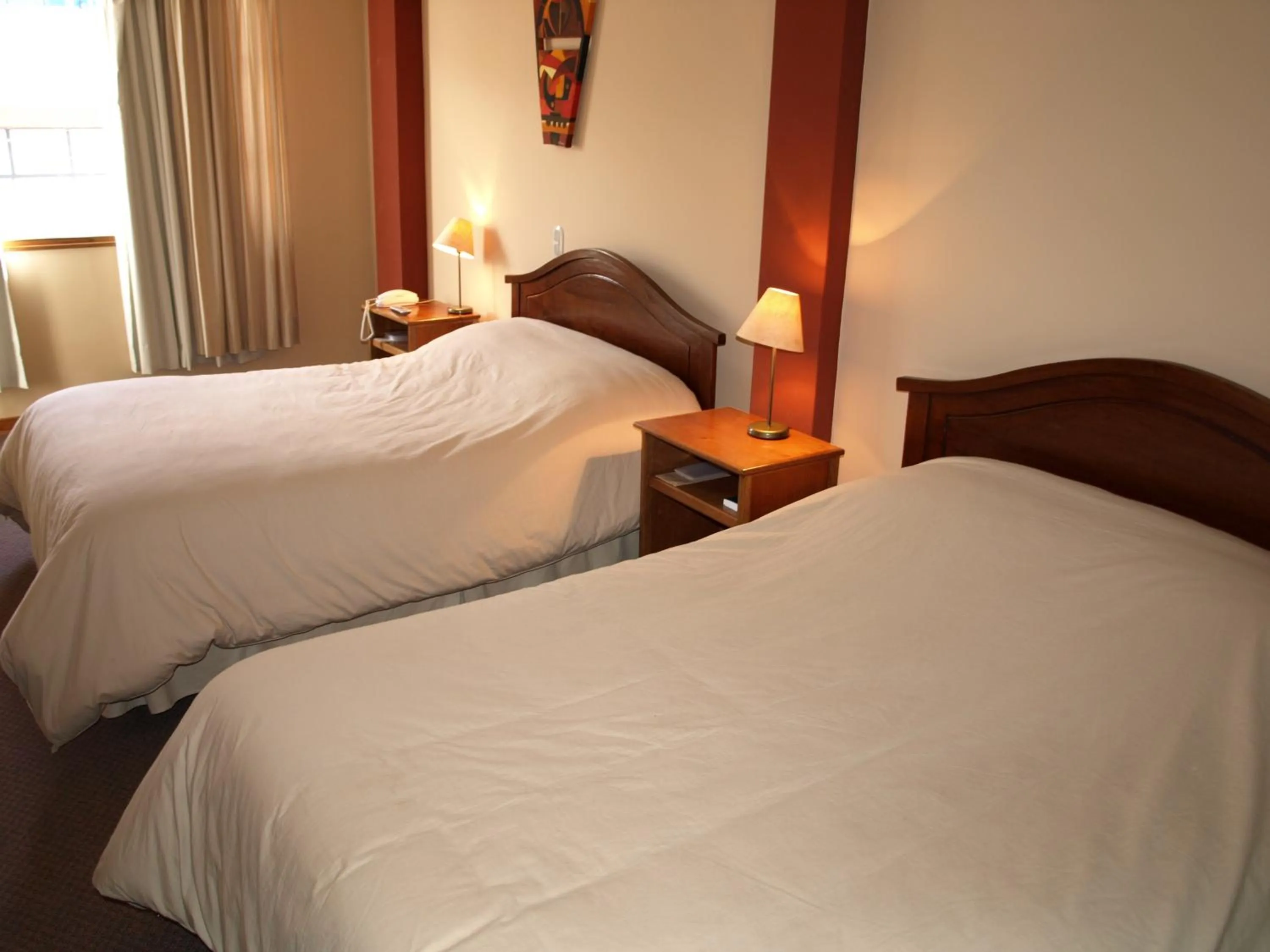 Bed in Qelqatani Hotel