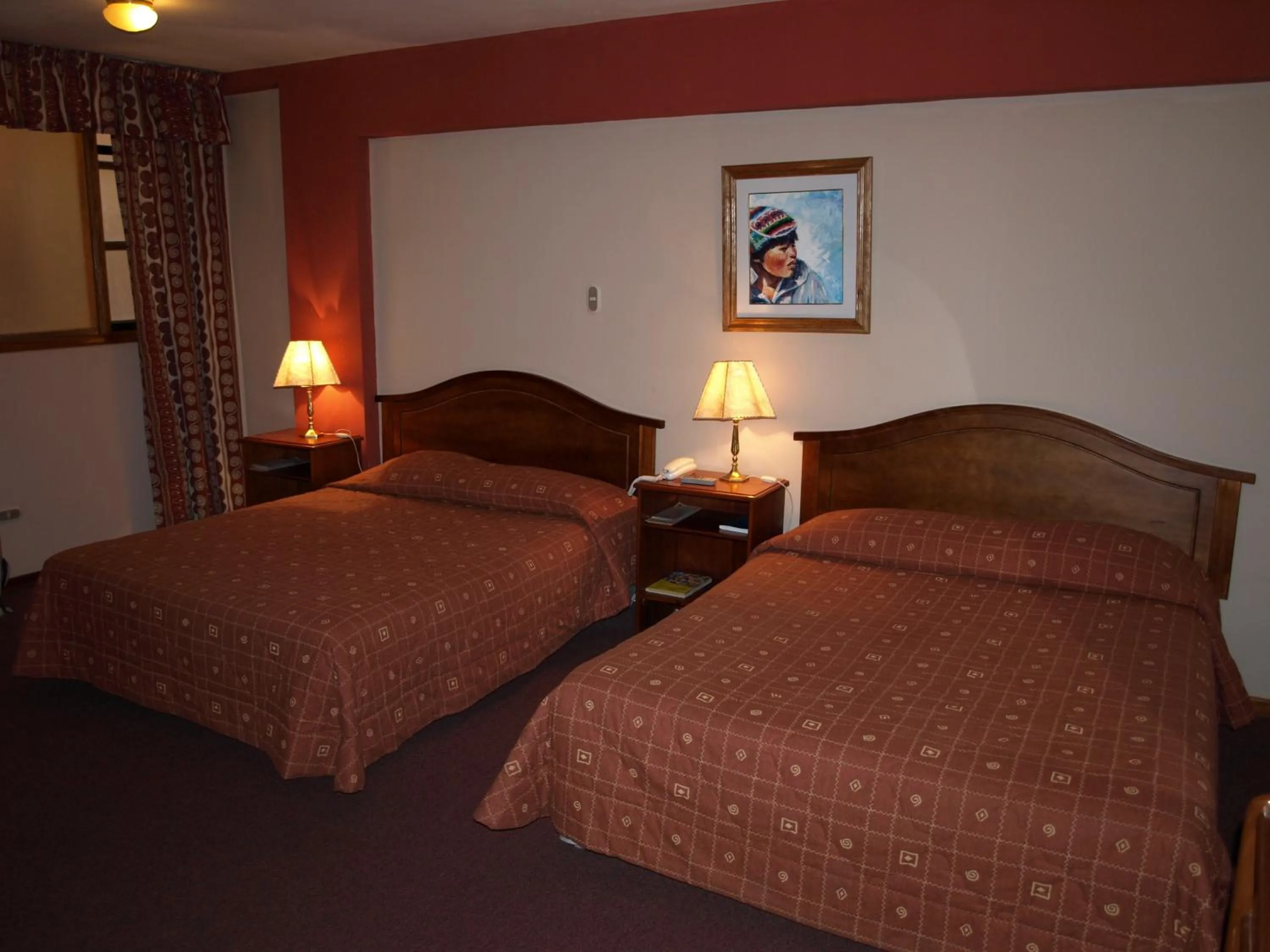 Bed in Qelqatani Hotel