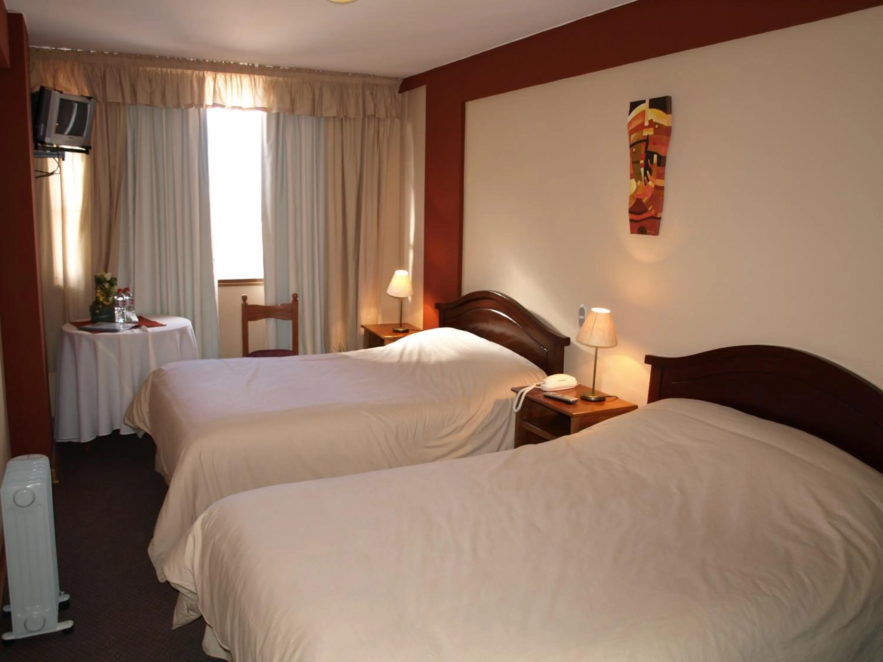 Bed in Qelqatani Hotel