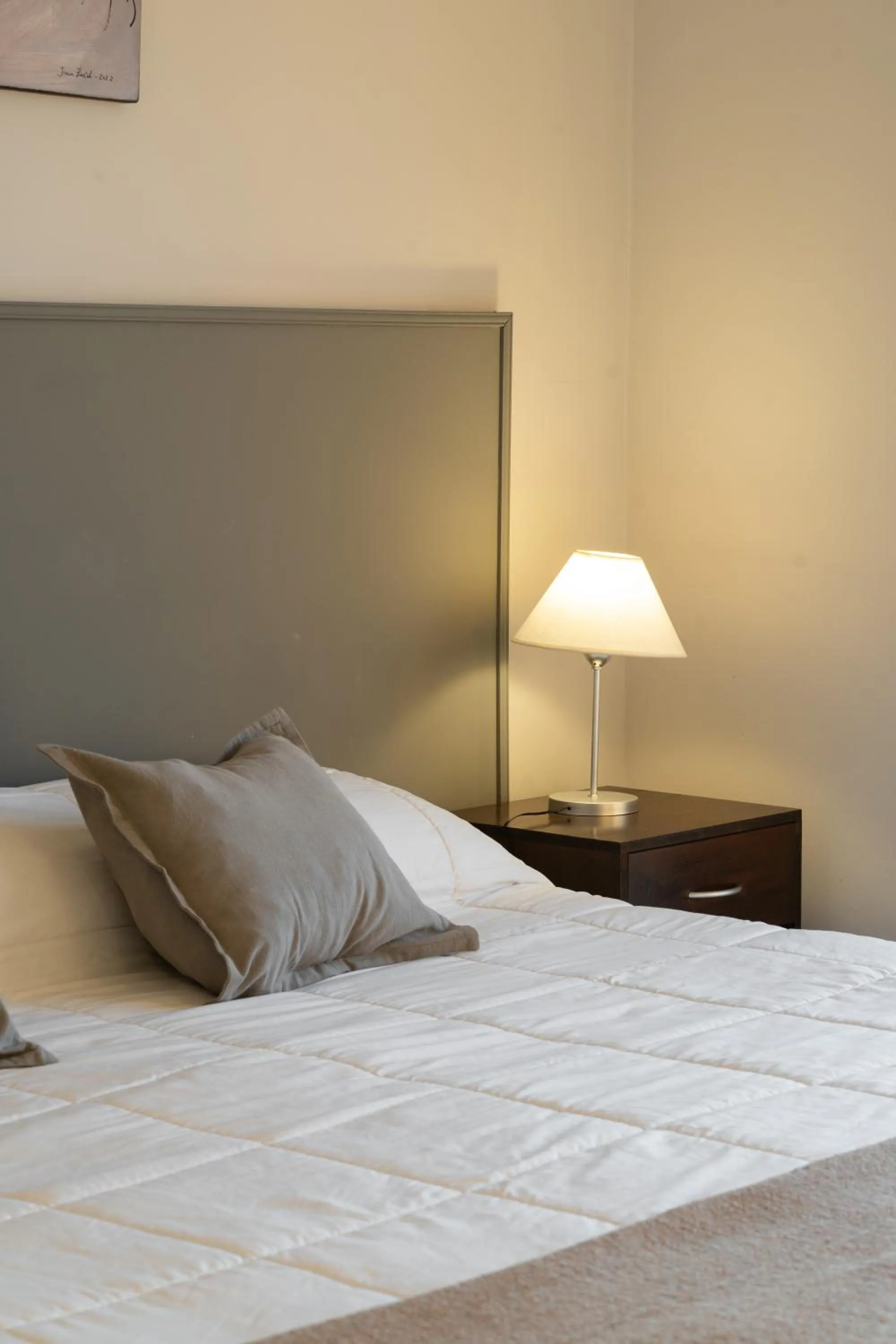 Bed in NBH Lacus Boutique Hotel