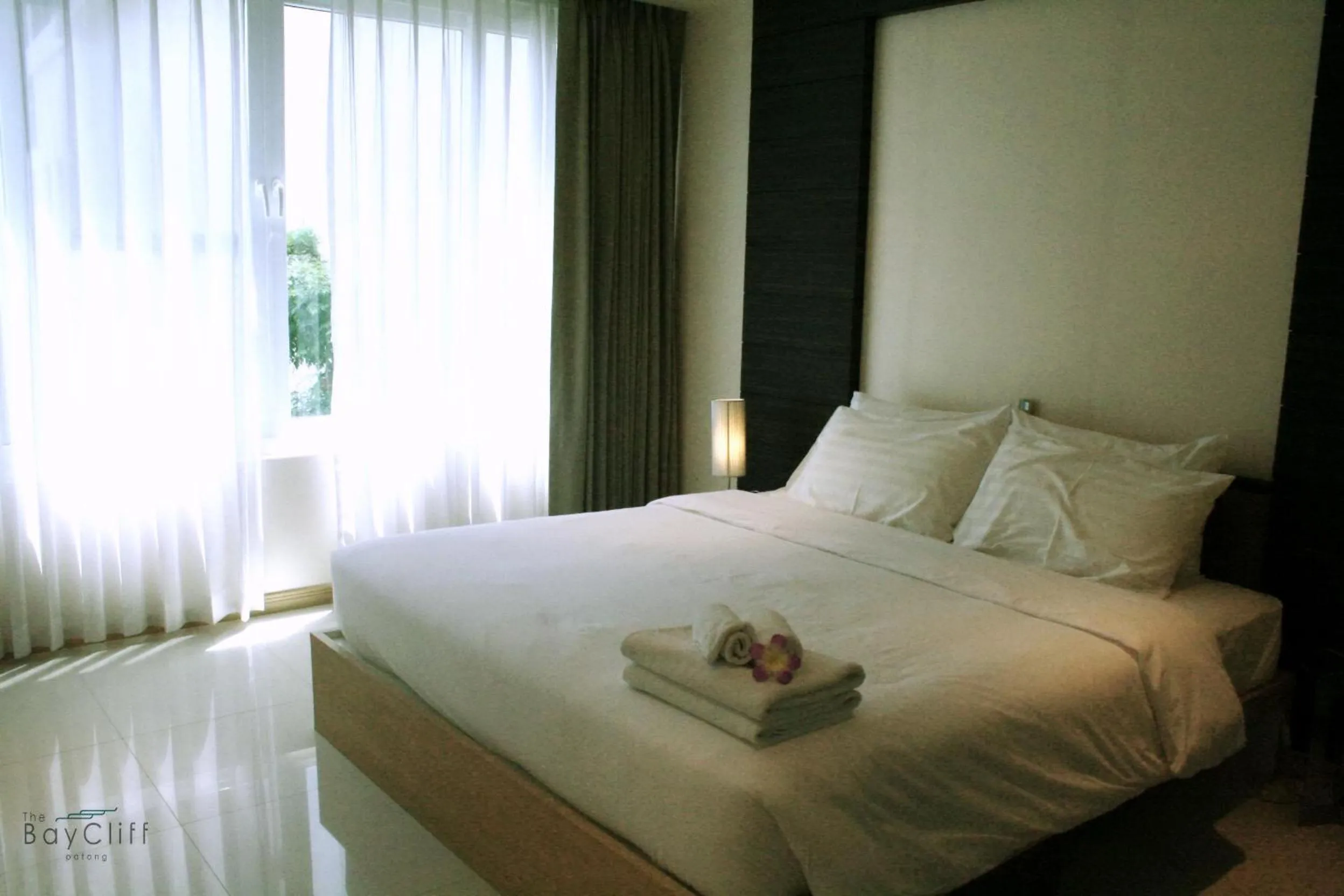 Bed in The Baycliff Residences