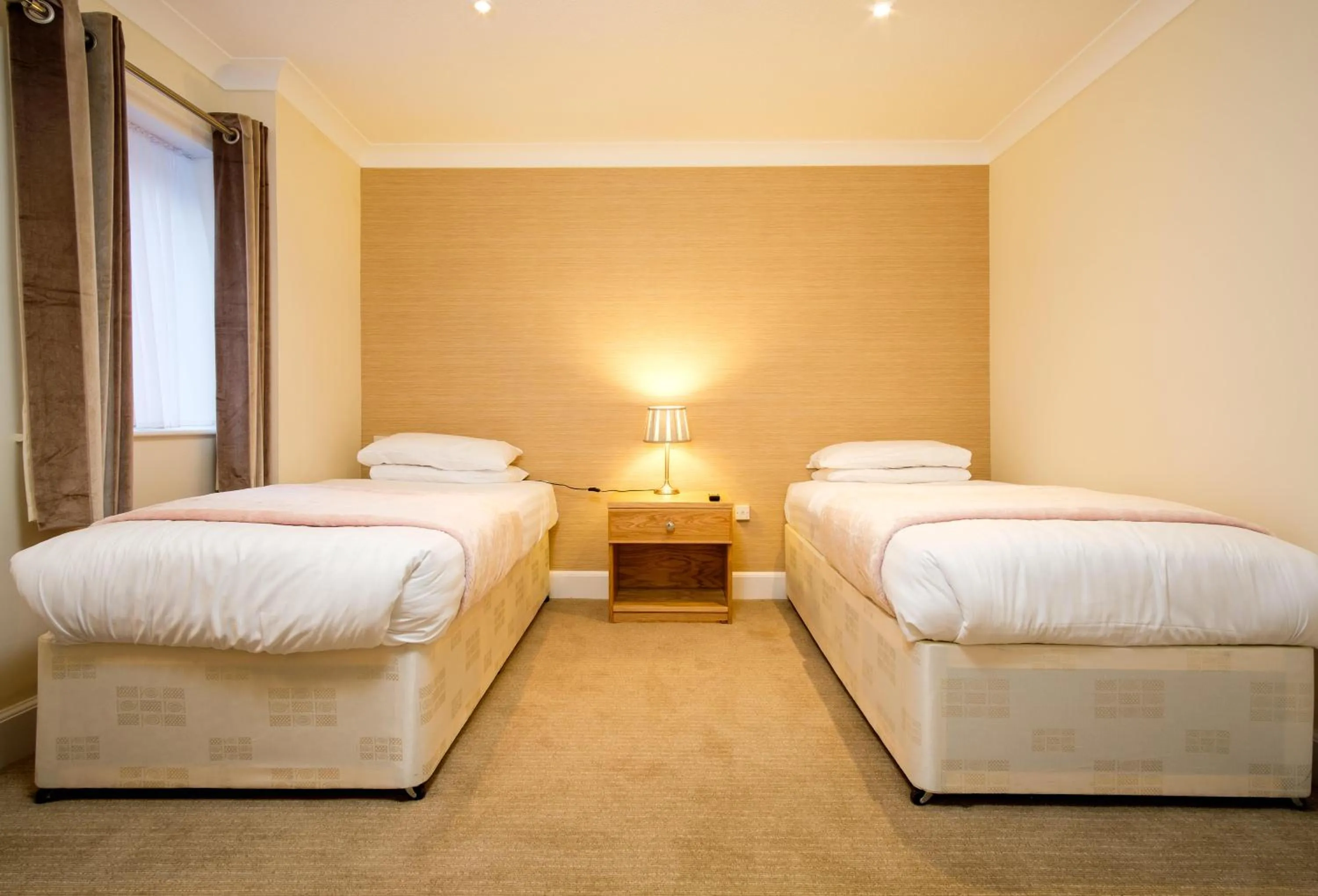 Bed in Adamson Hotel