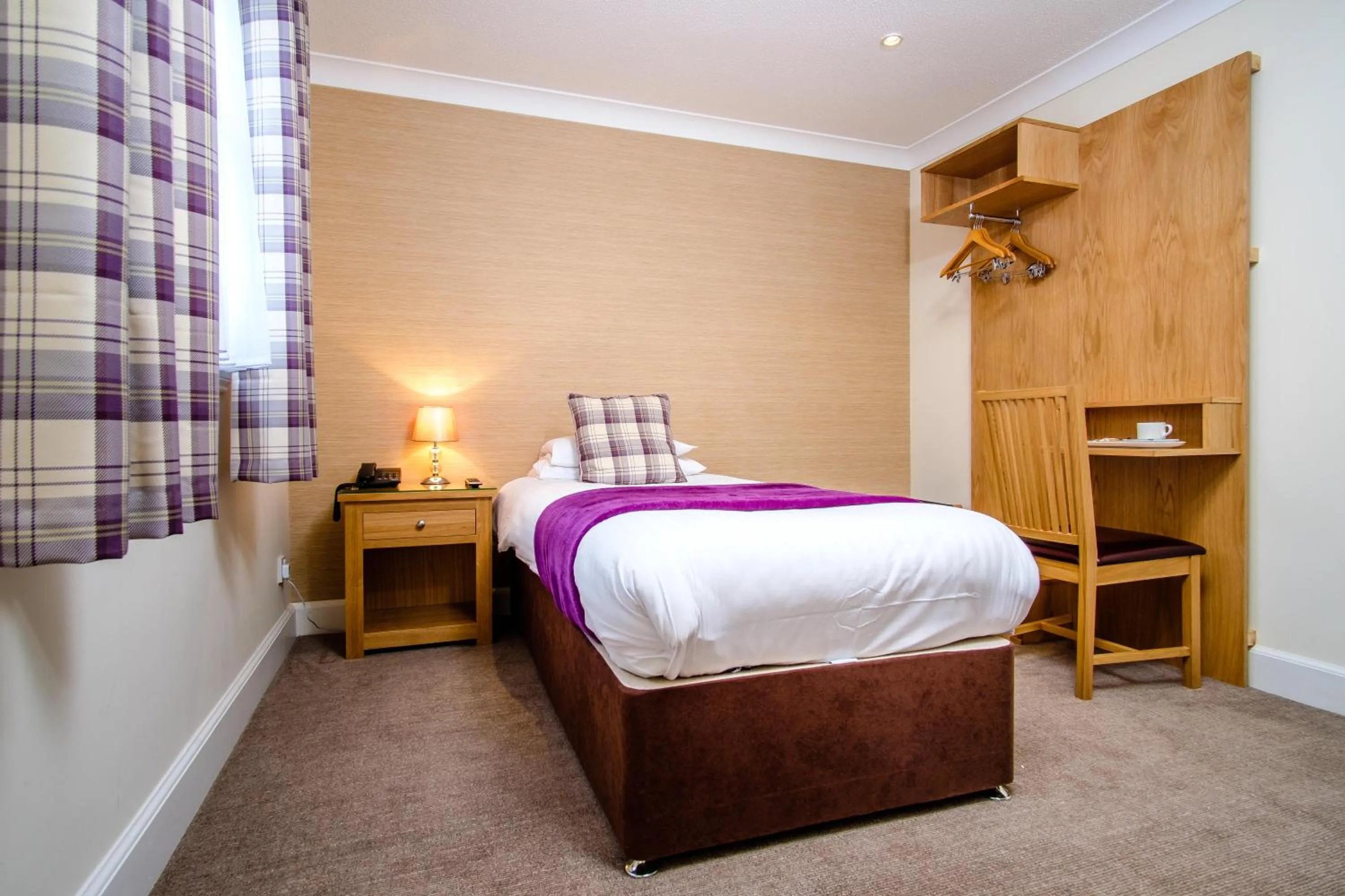 Bed in Adamson Hotel