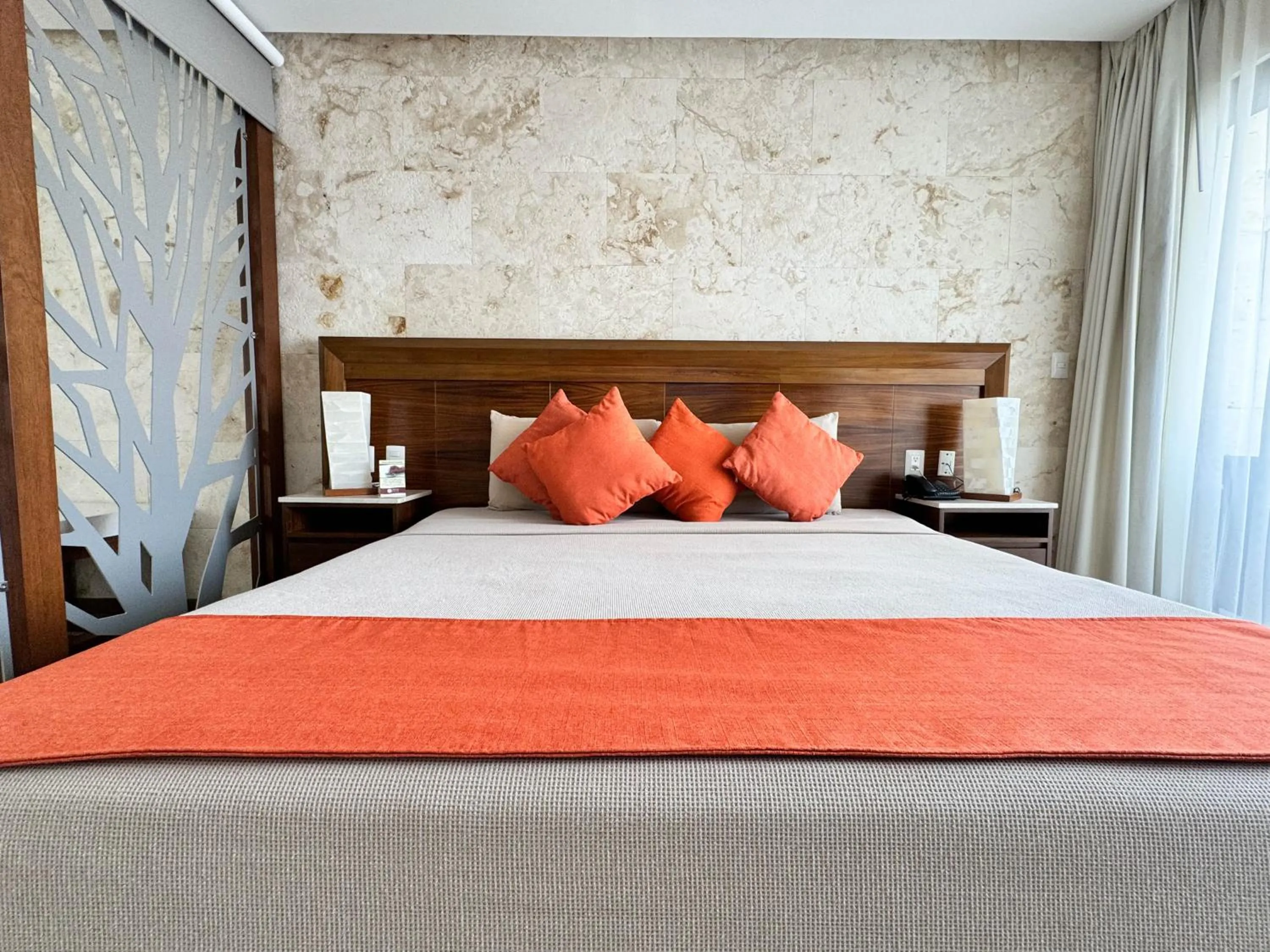 Bed in Grand Fifty Suites