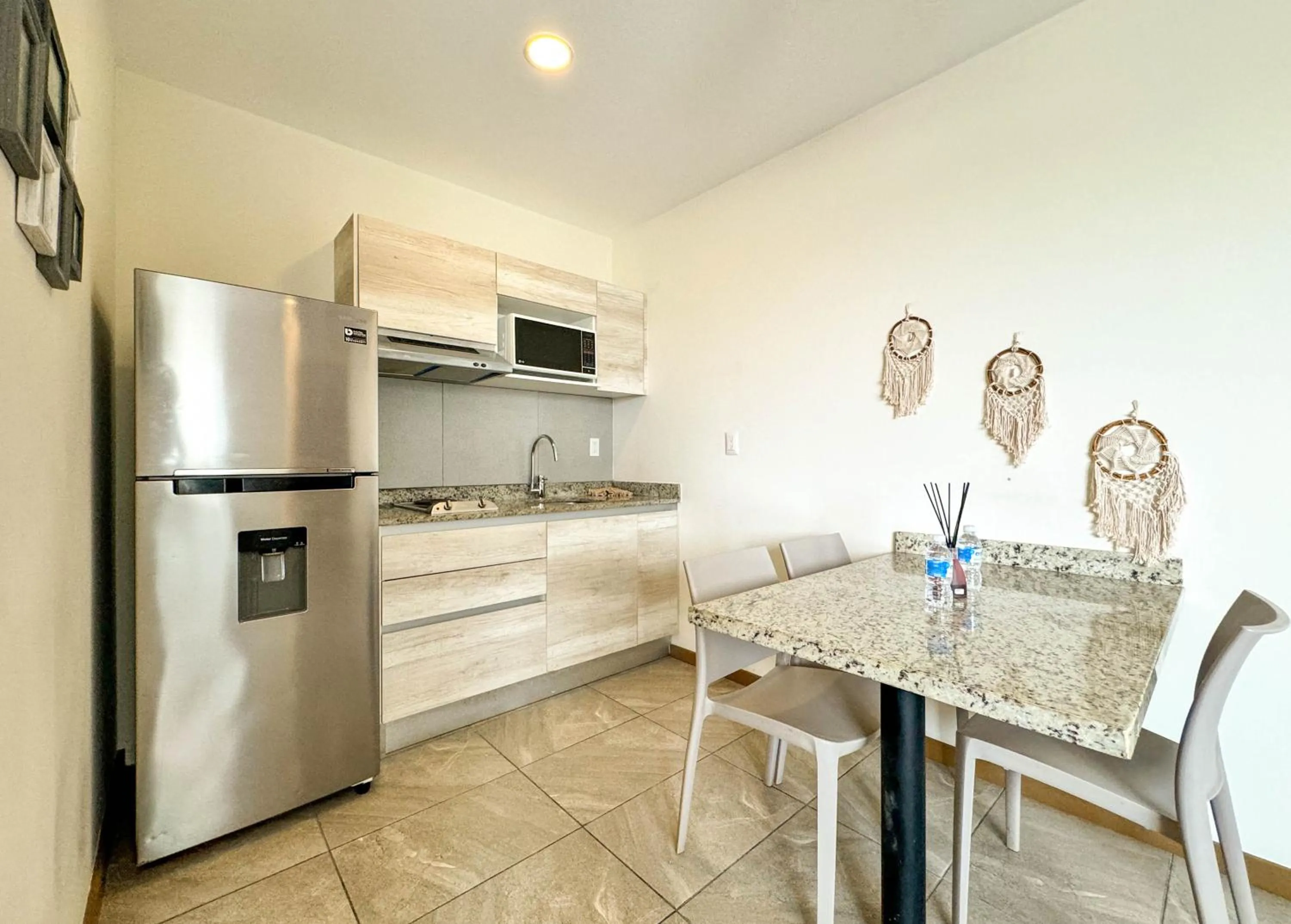 Kitchen or kitchenette in Grand Fifty Suites