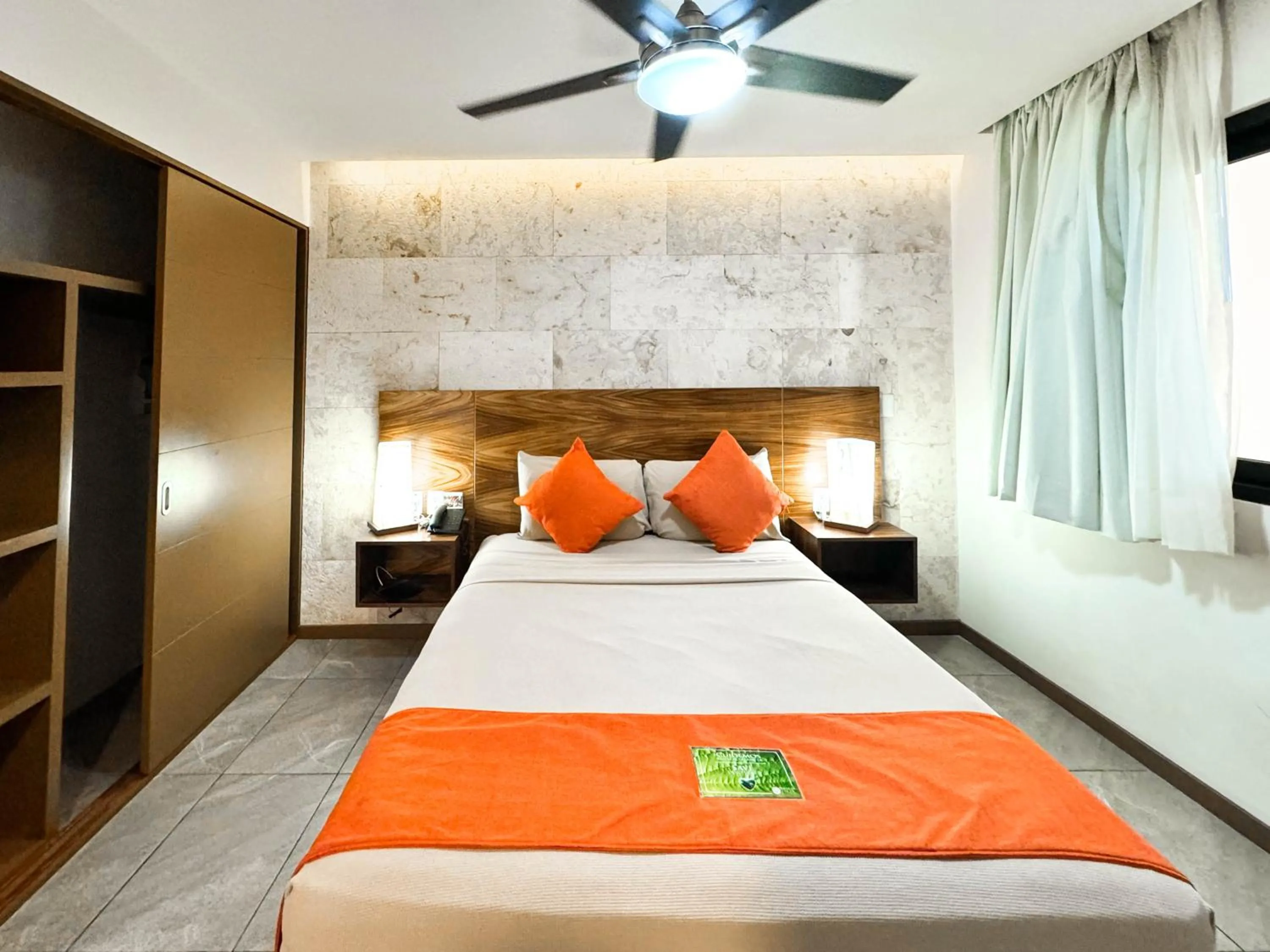 Bed in Grand Fifty Suites