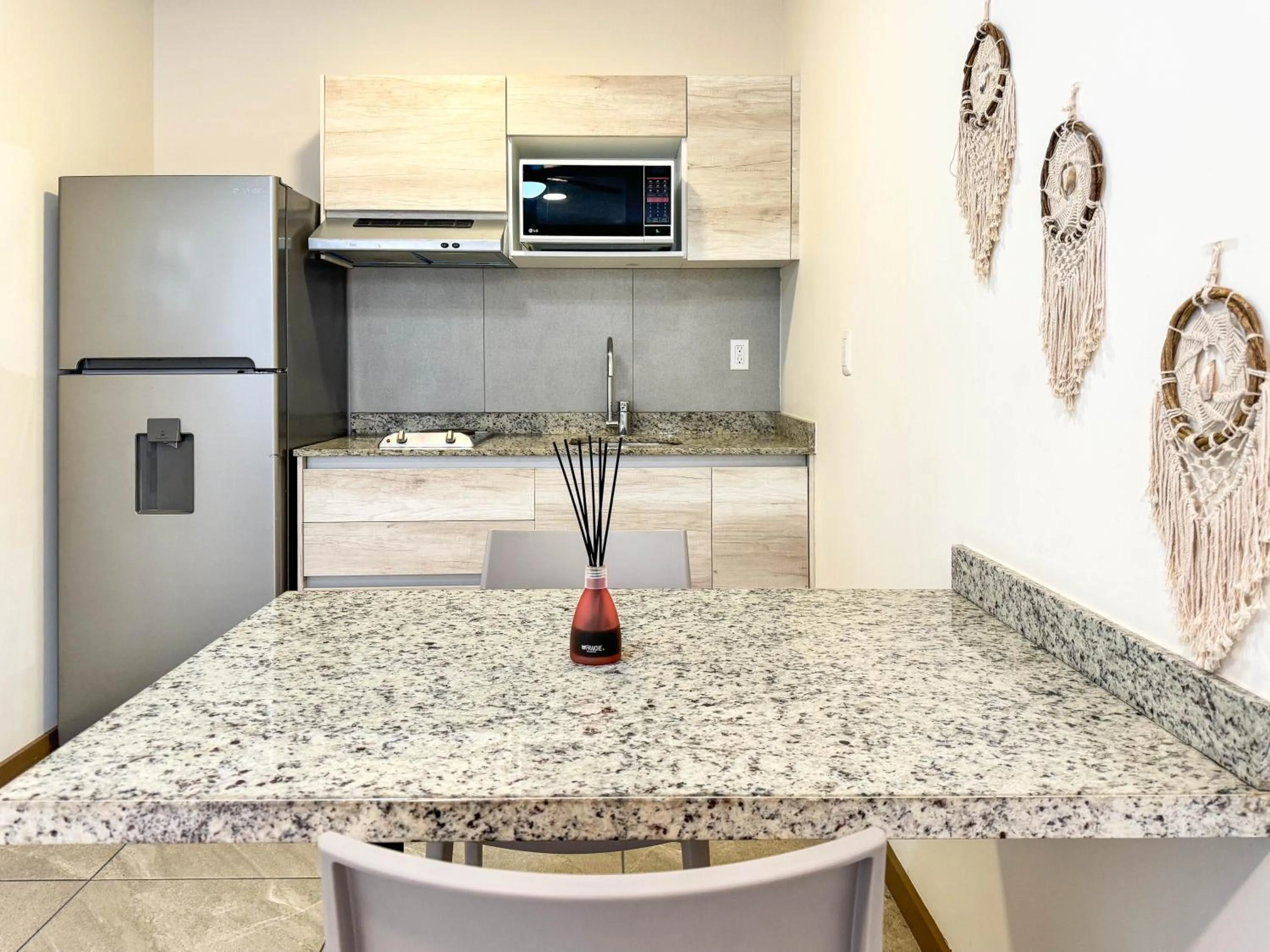 Kitchen or kitchenette in Grand Fifty Suites