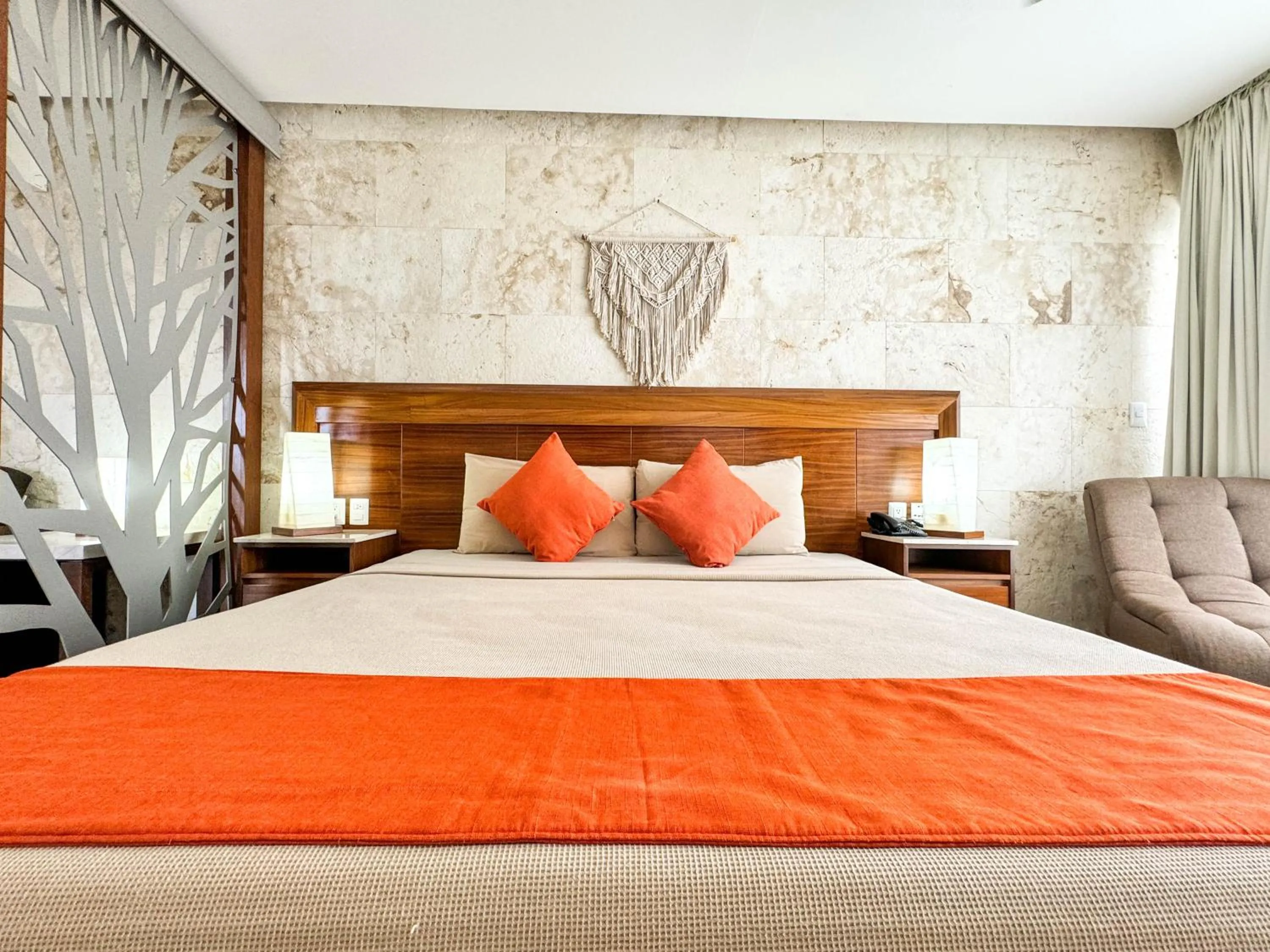 Bed in Grand Fifty Suites