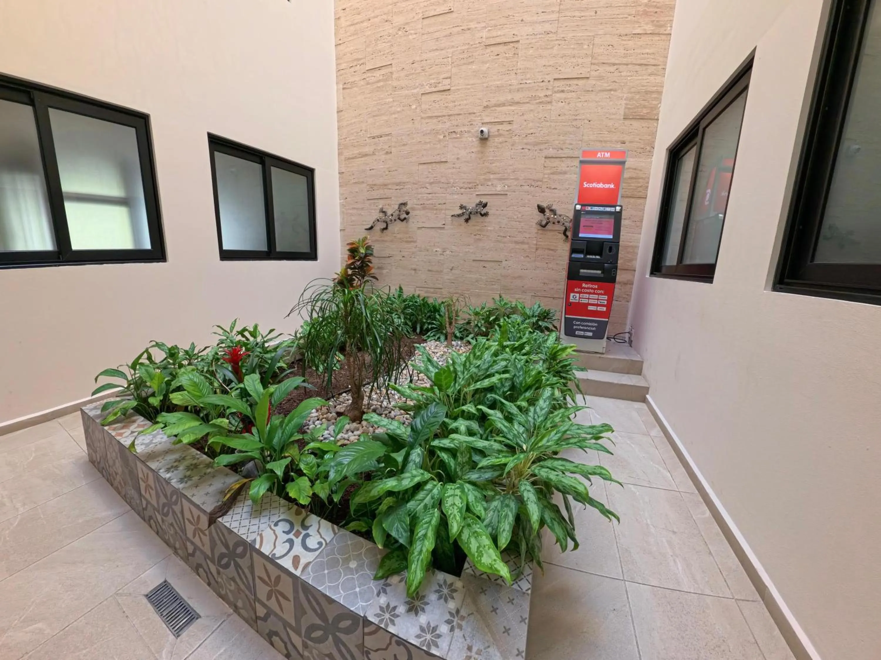 ATM in Grand Fifty Suites