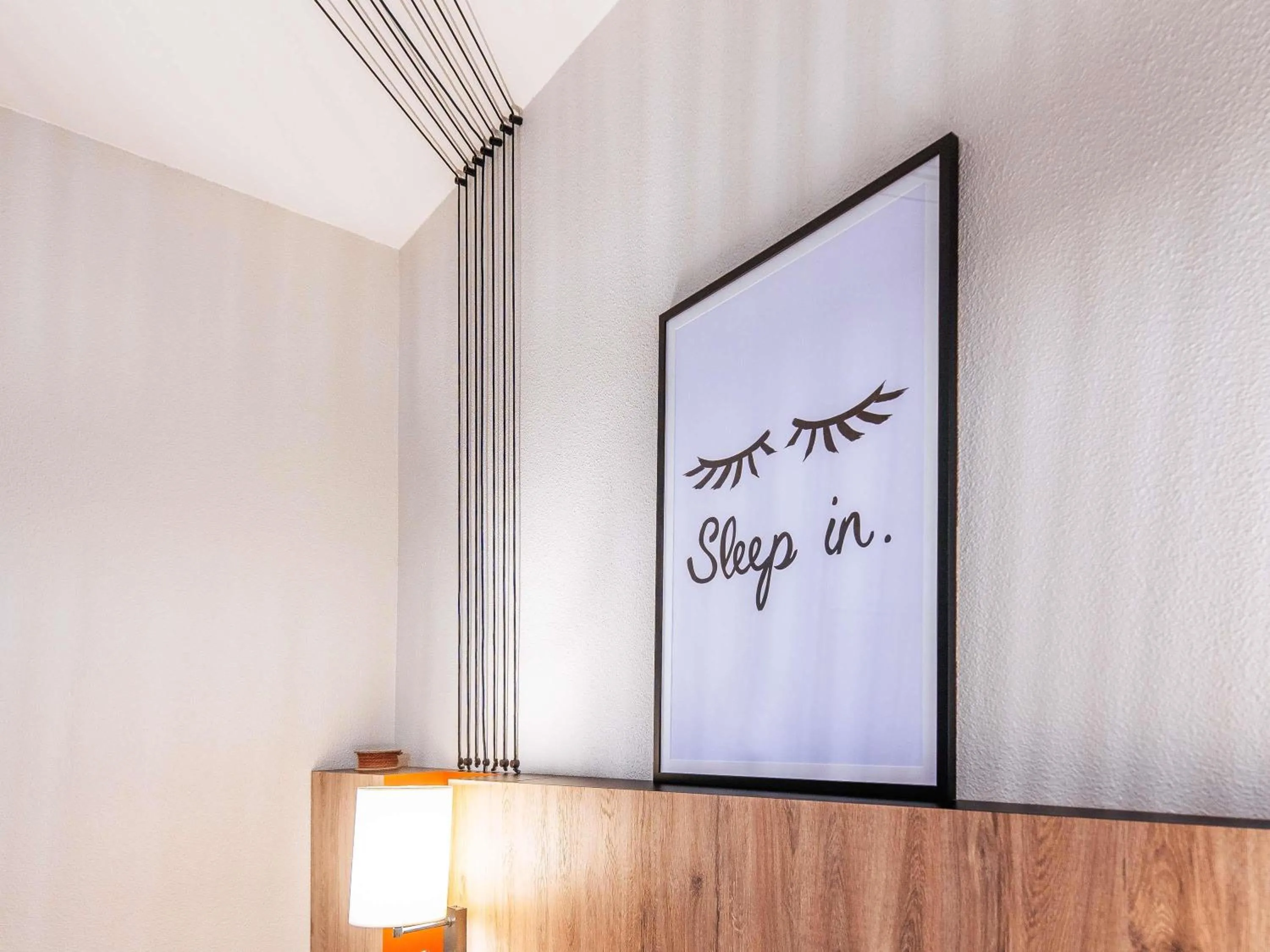 Bedroom in ibis Styles Toulouse Lavaur