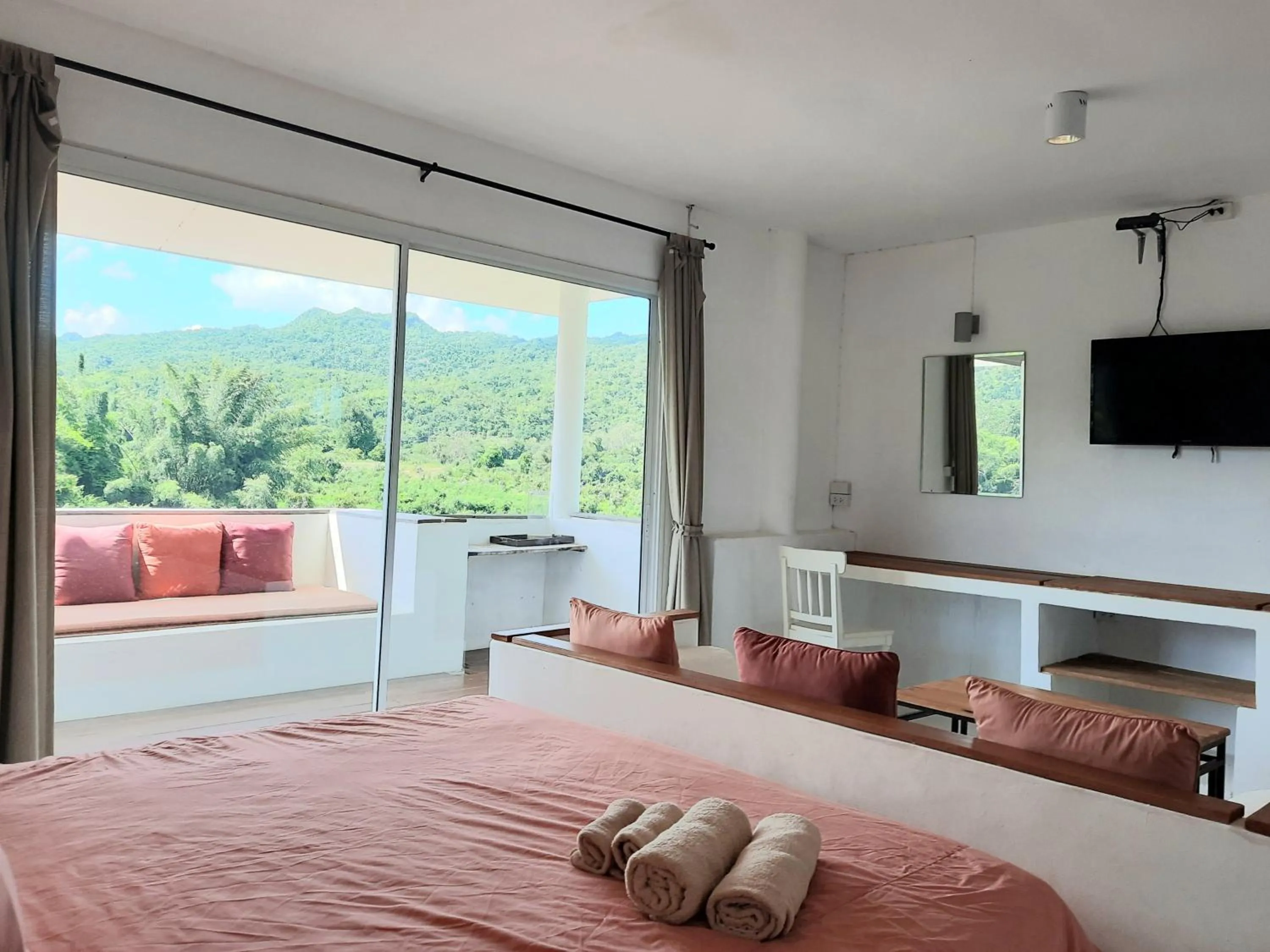 Bed in Chasorn Riverside Resort