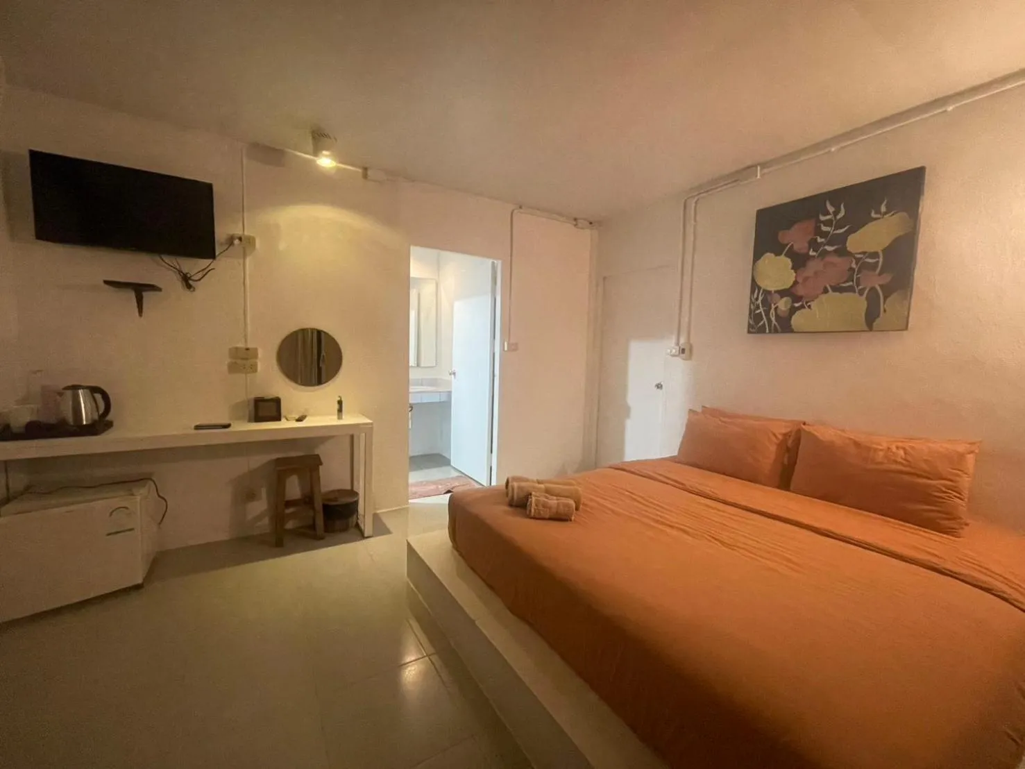 Bed in Chasorn Riverside Resort