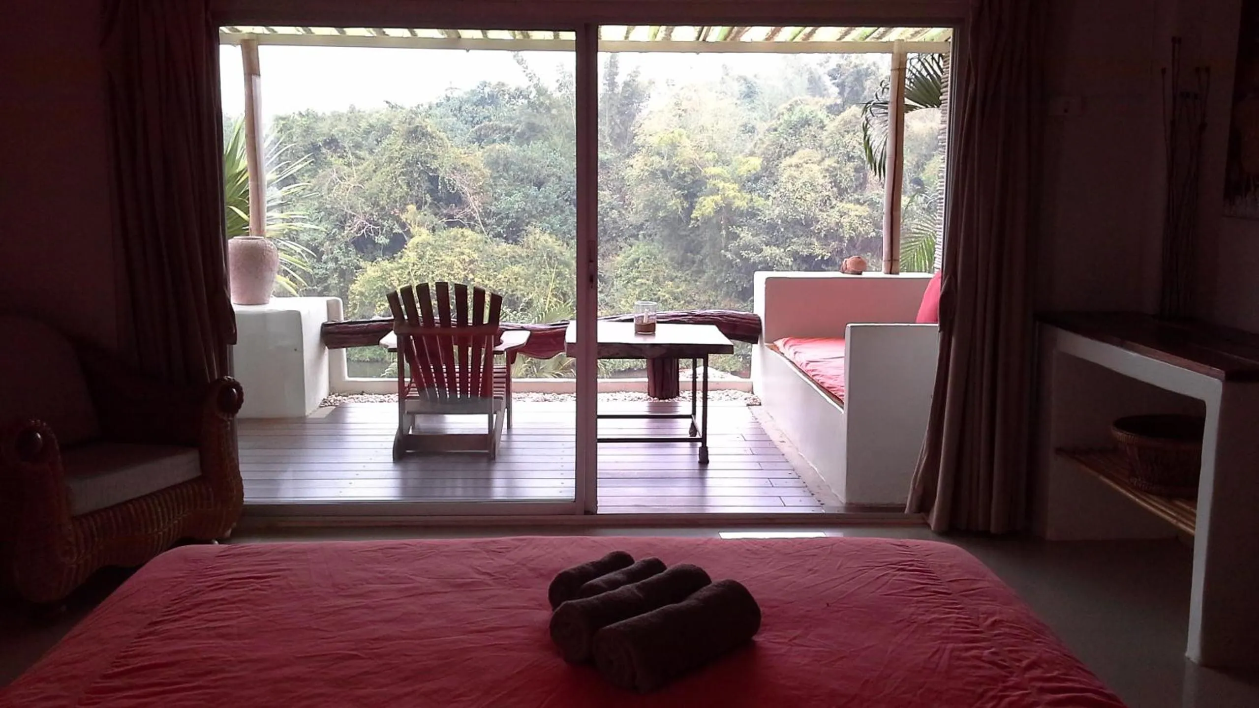 Bed in Chasorn Riverside Resort