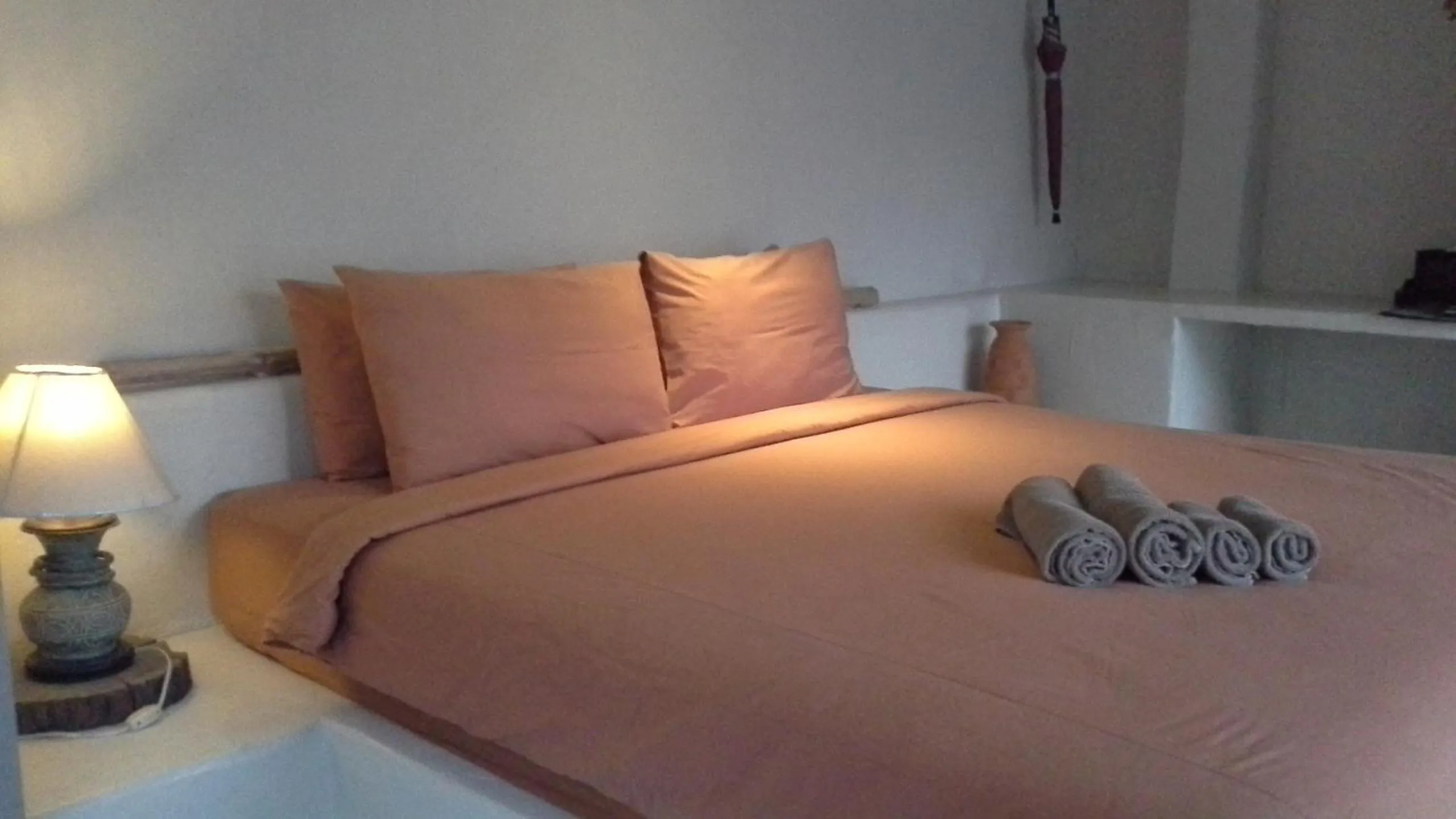 Bed in Chasorn Riverside Resort