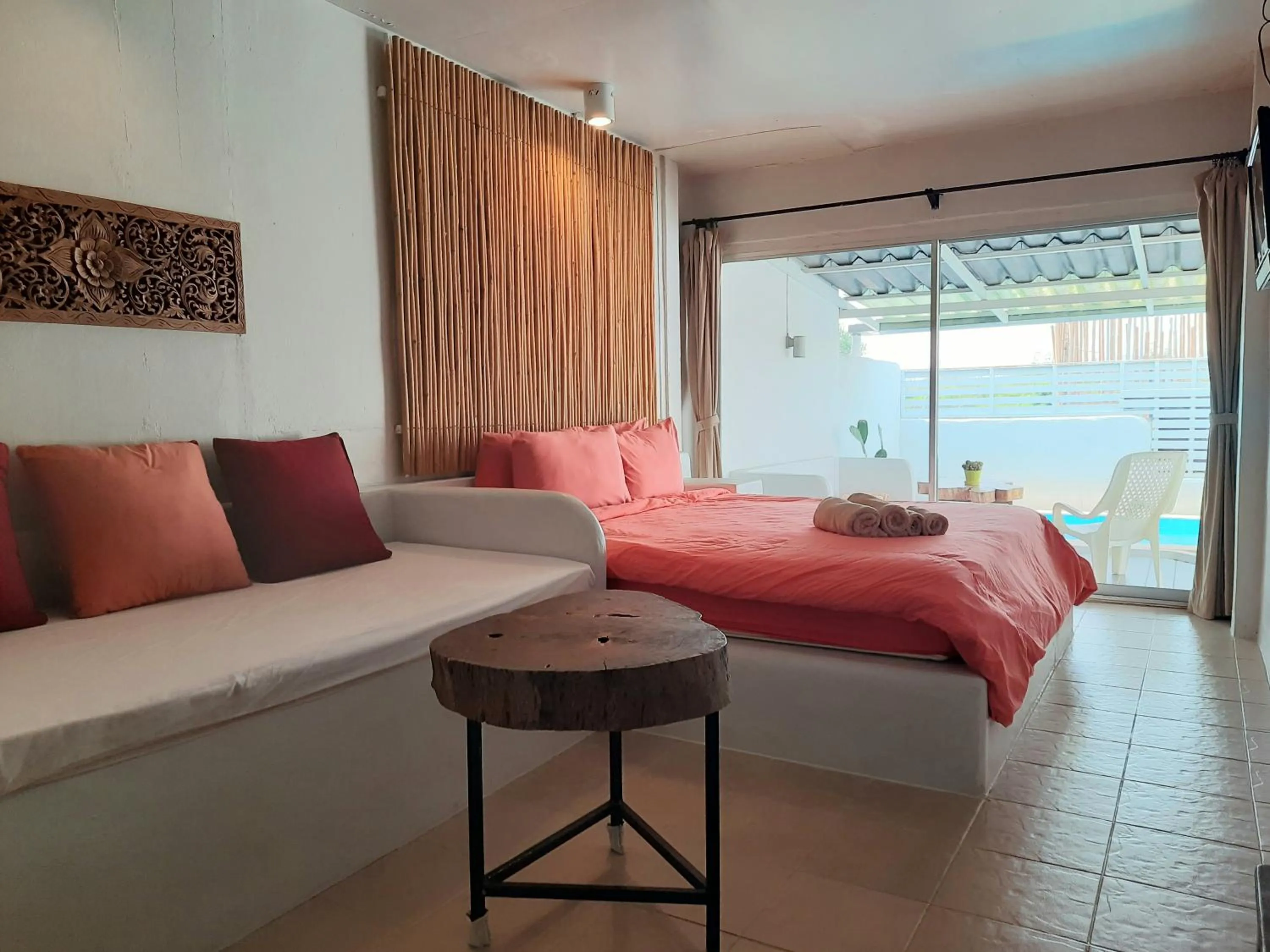 Bed in Chasorn Riverside Resort