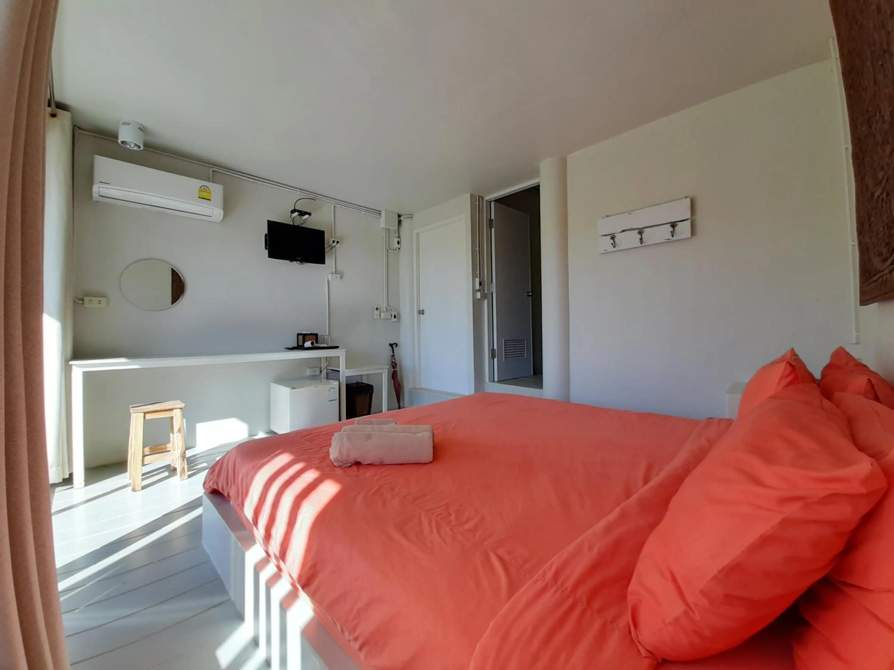 Bed in Chasorn Riverside Resort