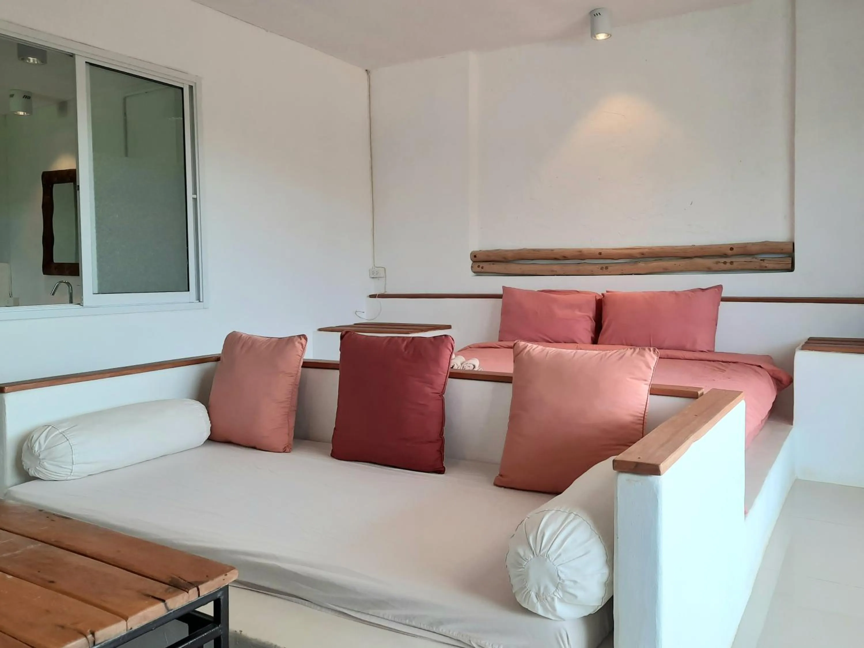 Bed in Chasorn Riverside Resort