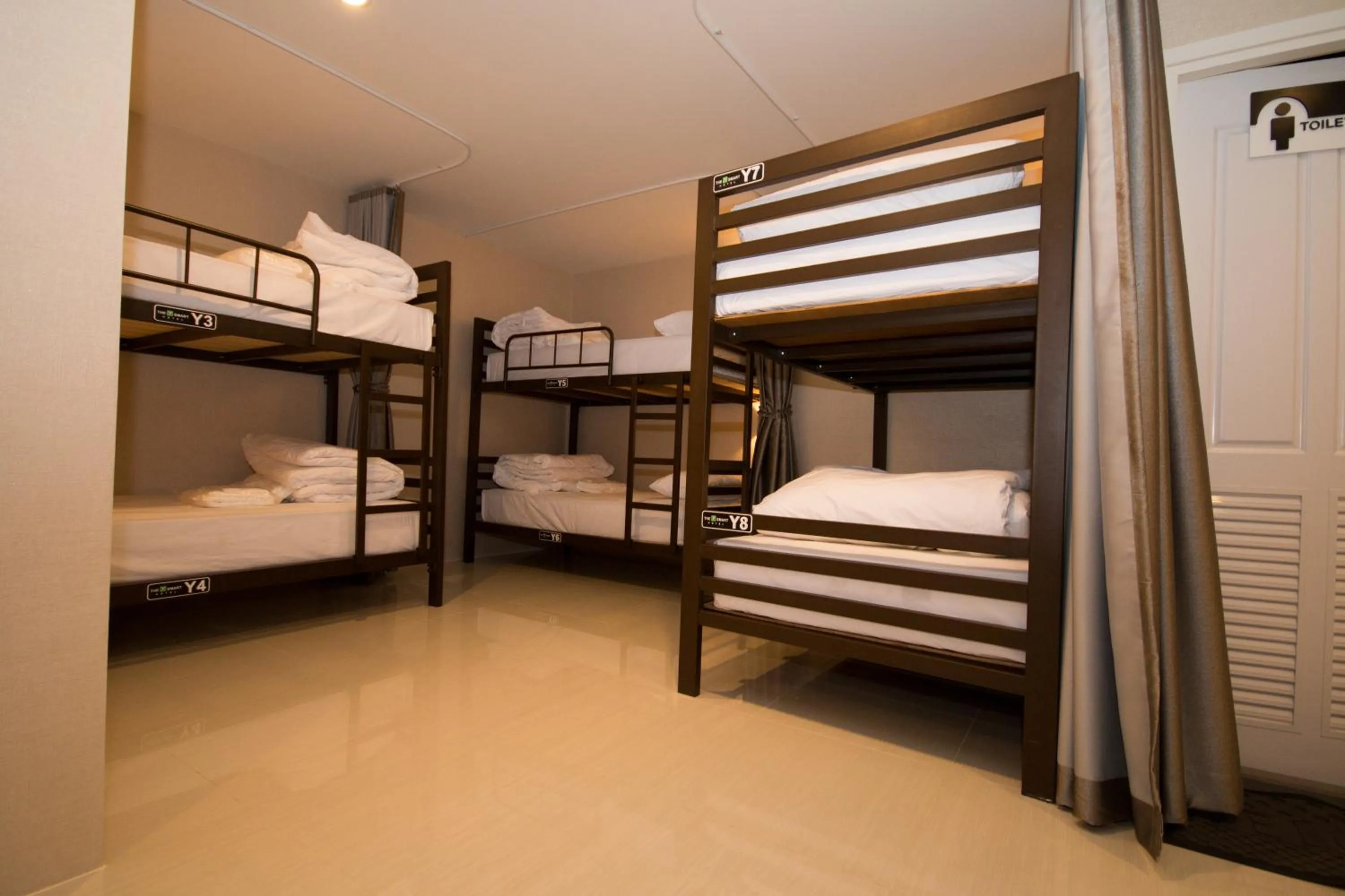 Bed in The Y Smart Hotel