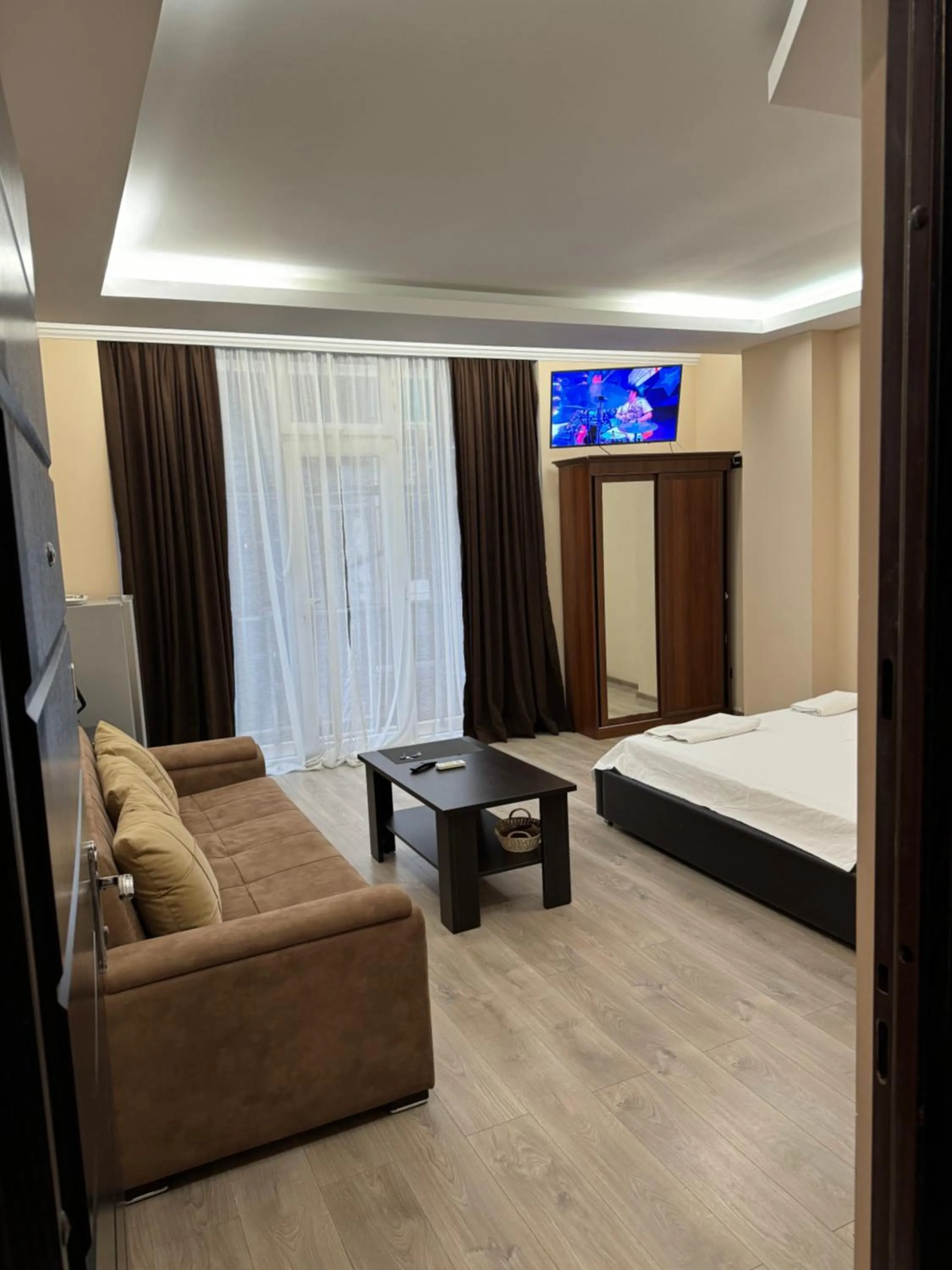 Bed in Iko's Family Apartments