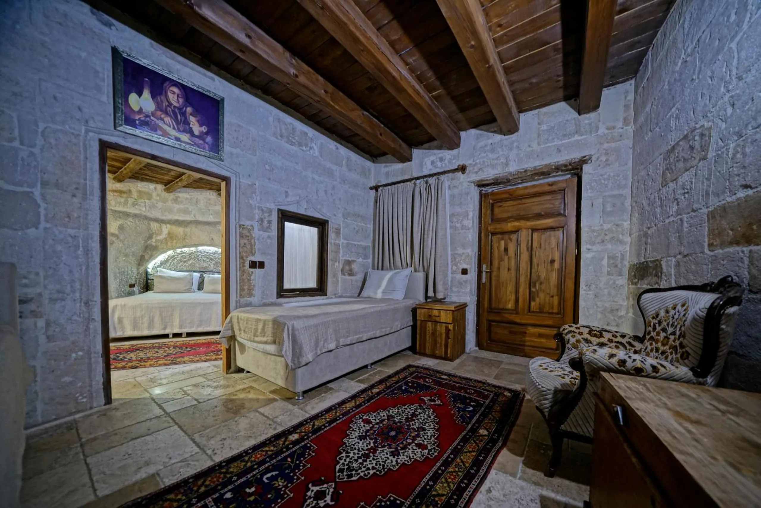 Photo of the whole room, Bed in Holiday Cave Hotel