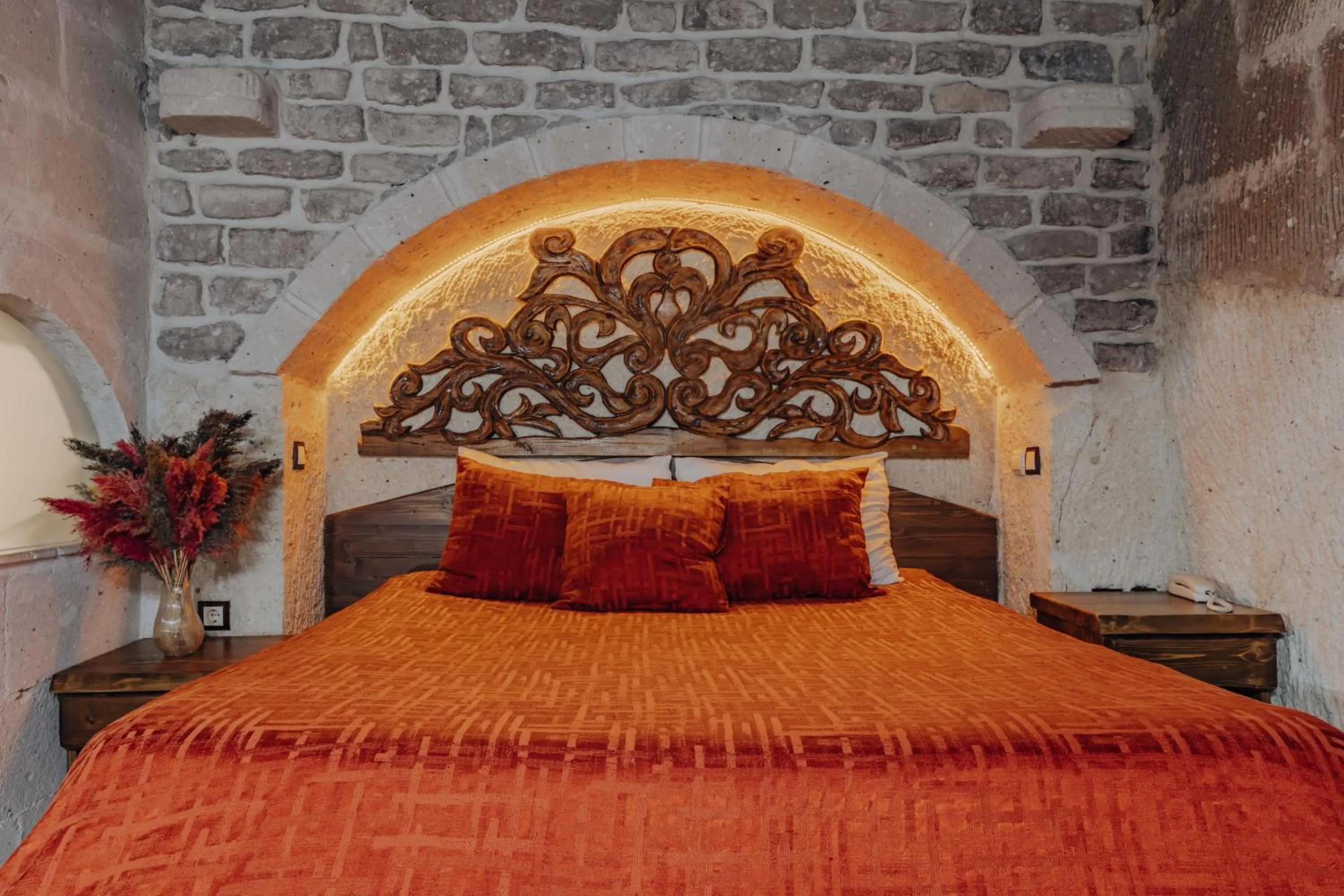 Bed in Holiday Cave Hotel
