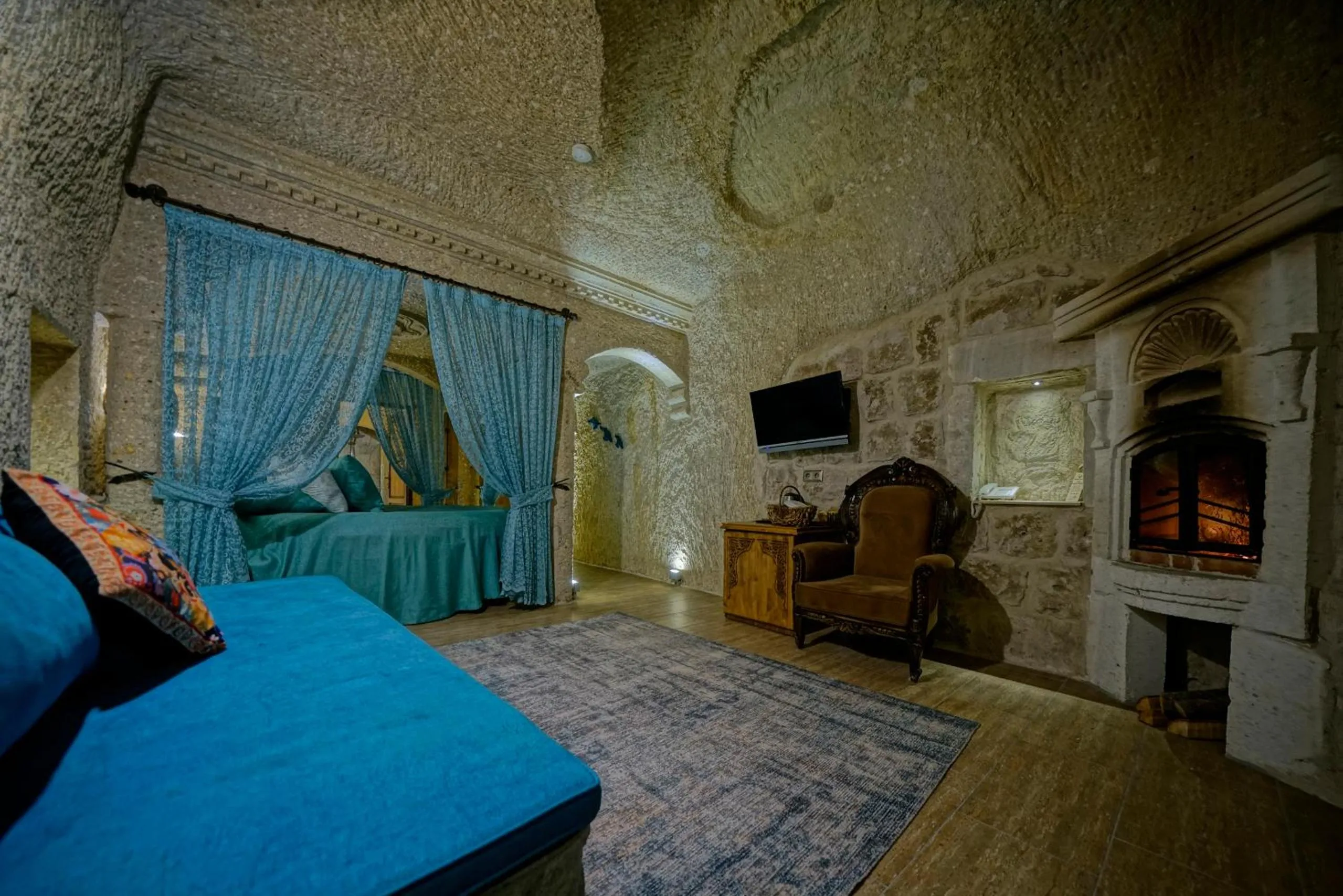 Bed in Holiday Cave Hotel
