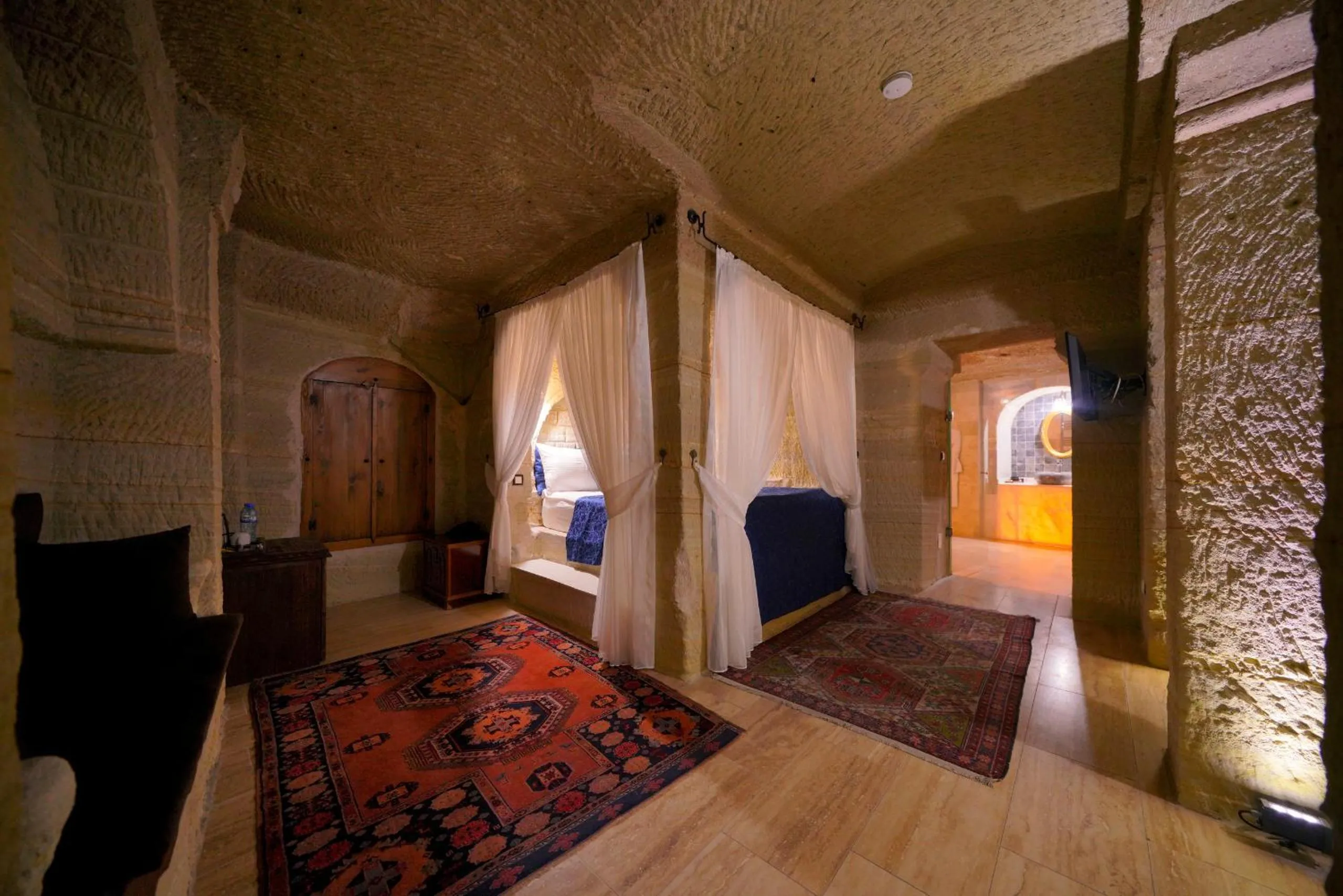 Bed in Holiday Cave Hotel