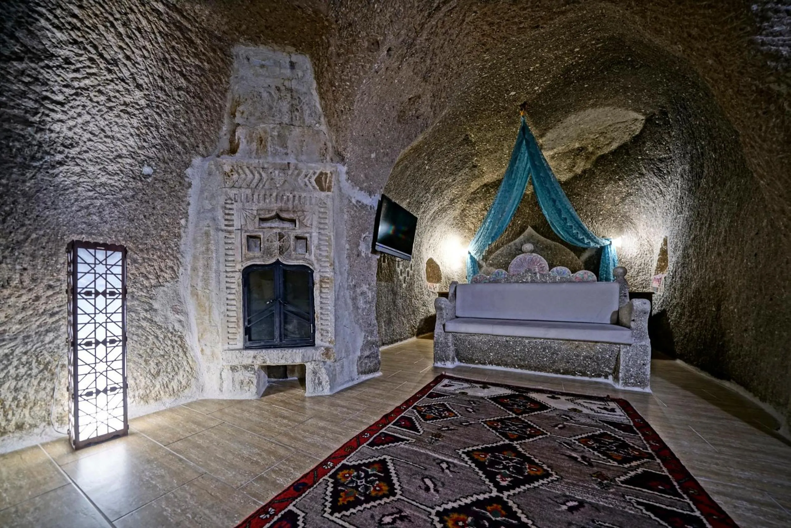 Bed in Holiday Cave Hotel