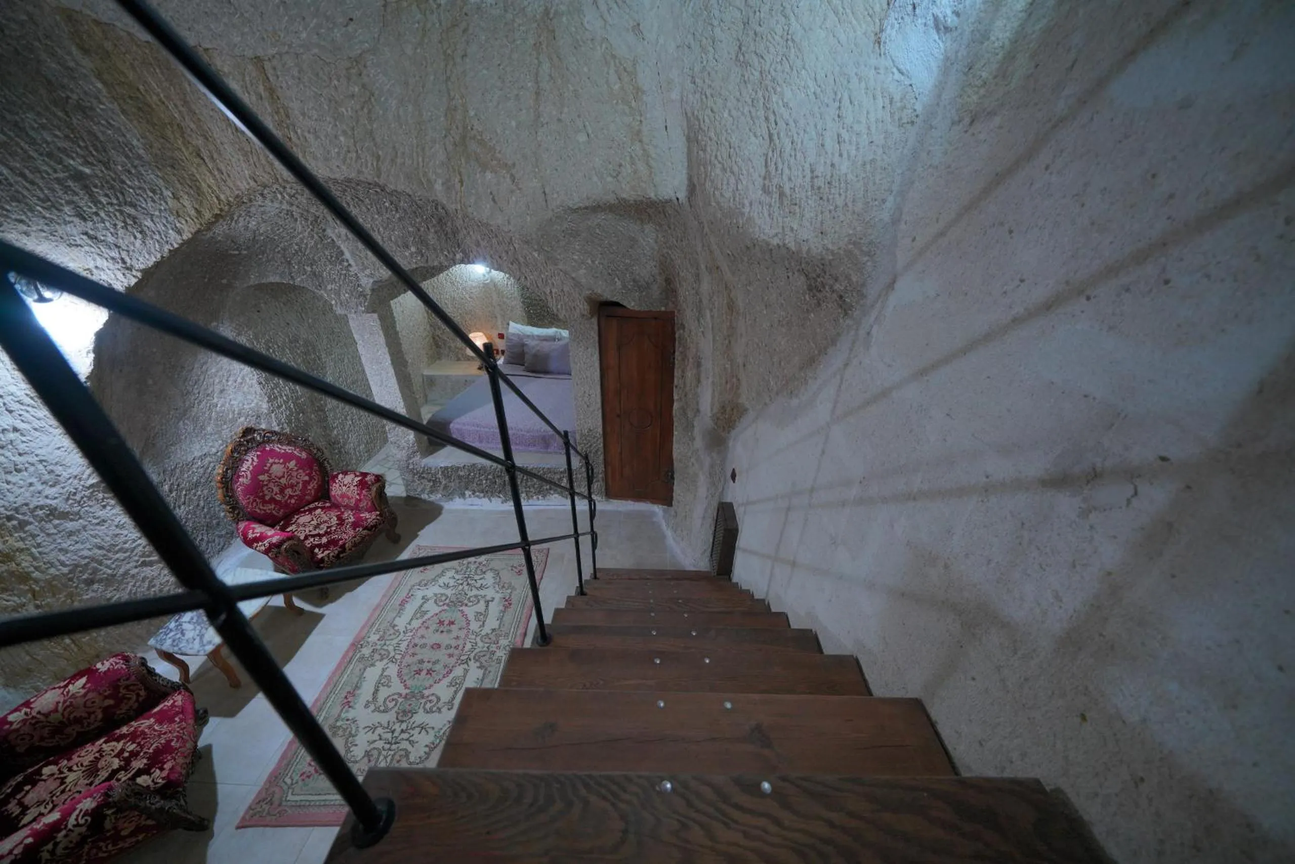Bed in Holiday Cave Hotel